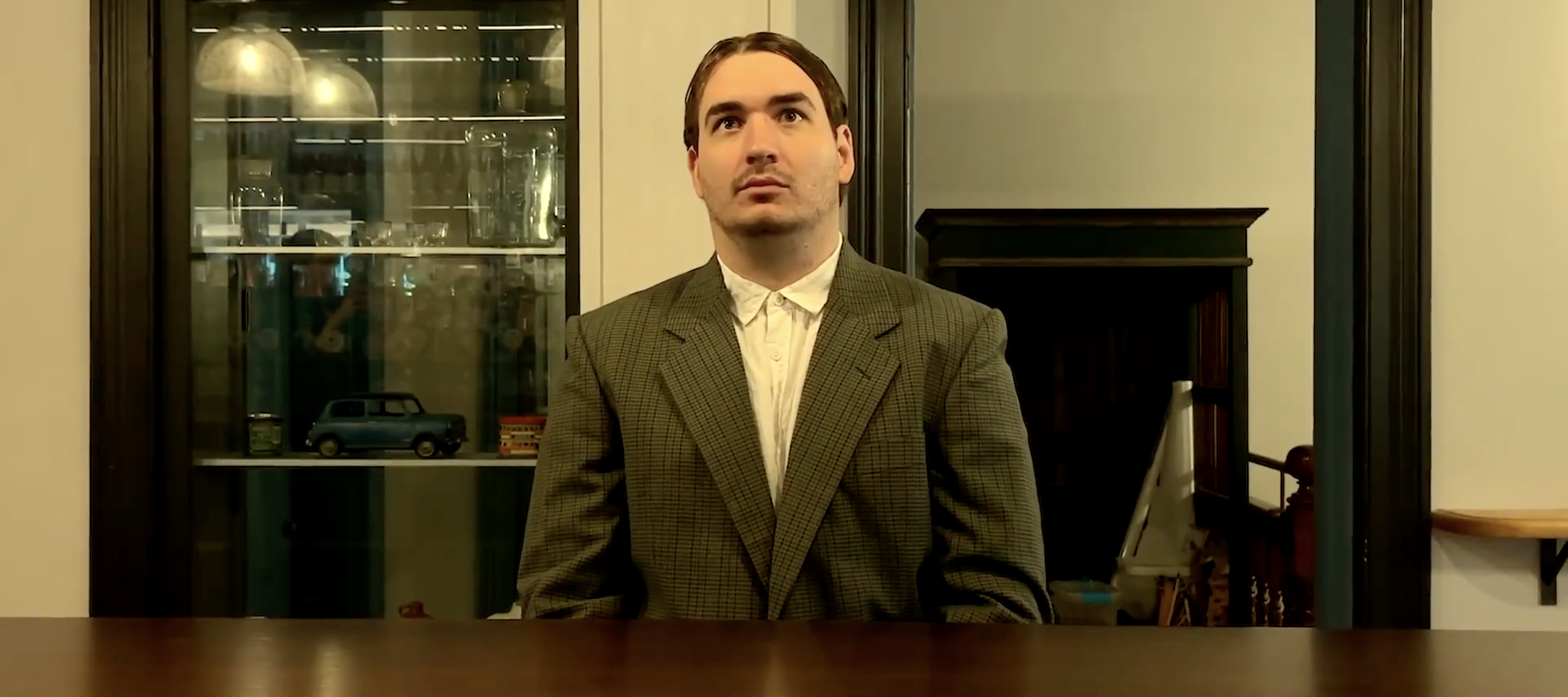 THREE OLIVES

"Three Olives" is a darkly comic short set in an elegant bar where silence and social anxiety rule. It follows a painfully conflict-averse bartender and a fragile customer whose simple request for a dry martini with three olives spirals