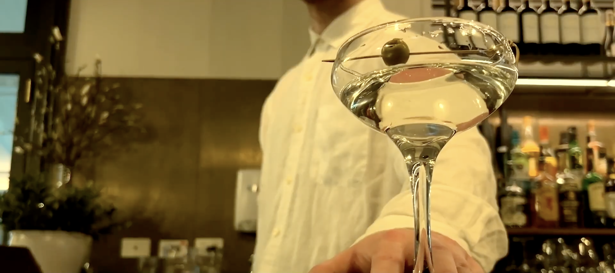 THREE OLIVES

"Three Olives" is a darkly comic short set in an elegant bar where silence and social anxiety rule. It follows a painfully conflict-averse bartender and a fragile customer whose simple request for a dry martini with three olives spirals