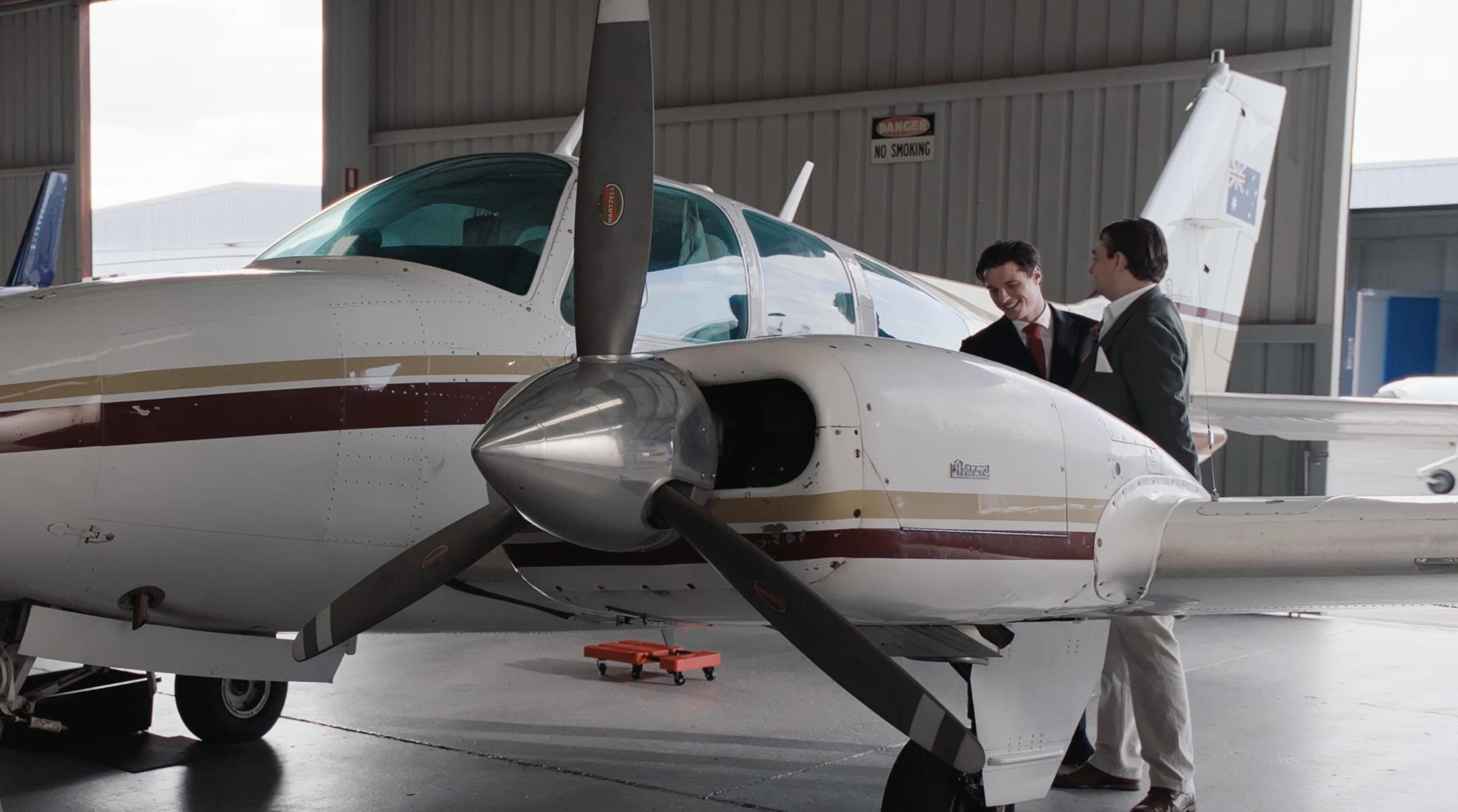 CLIVE´S JET

In a private hangar, a sleek self-important salesman and an aristocratic buyer circle around a luxury jet, competing ego for ego during an attempted sale. 