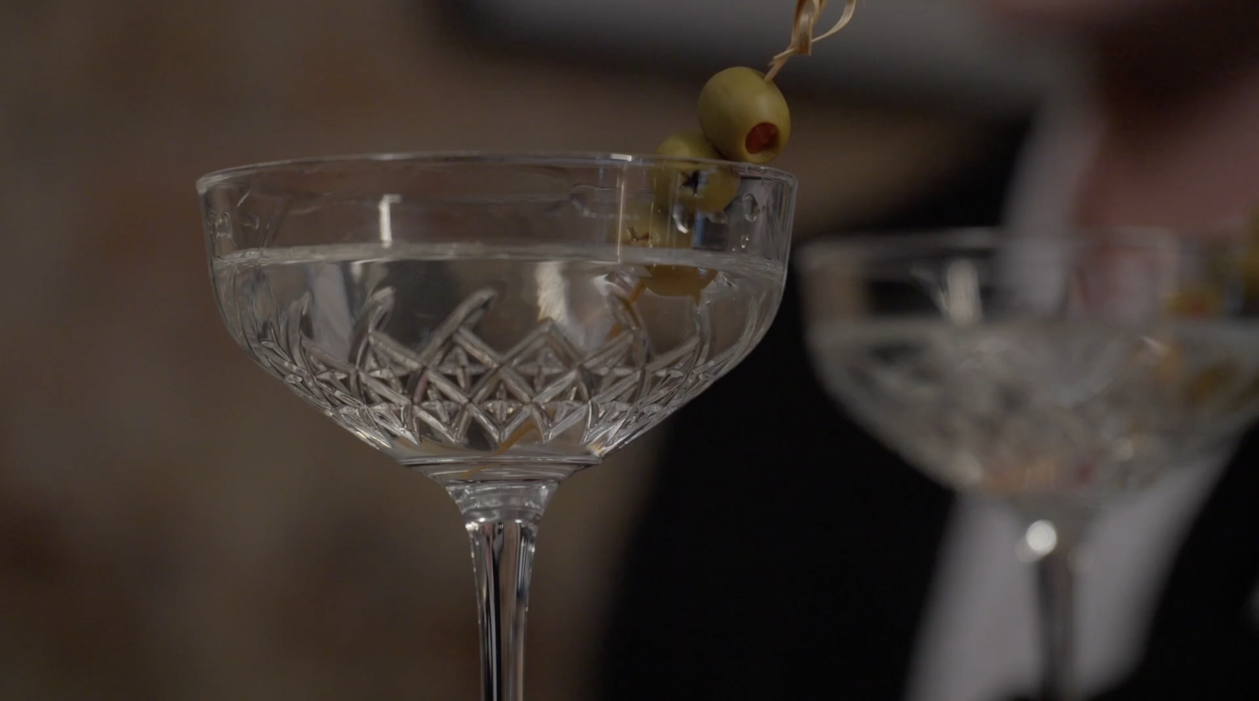 TENDER TREASON

In a smoky jazz bar, a dysfunctional married couple clink martinis and flirt as casually as they murder for their own interest. He’s a stylish sadist with a flair for violence and the subtle arrogance of a man who’s gotten away with t