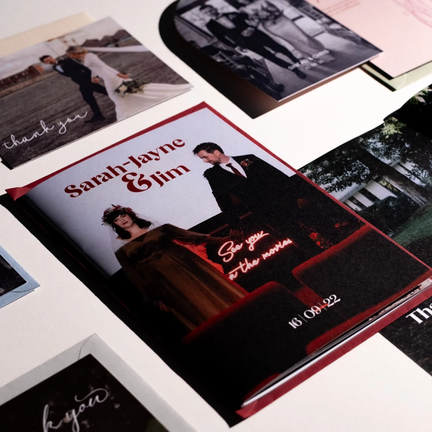 Wedding invitation featuring Sarah-Layne and Jim with a photo of the couple, event date August 16, 2022, and a neon light quote reading "See you at the cinema."