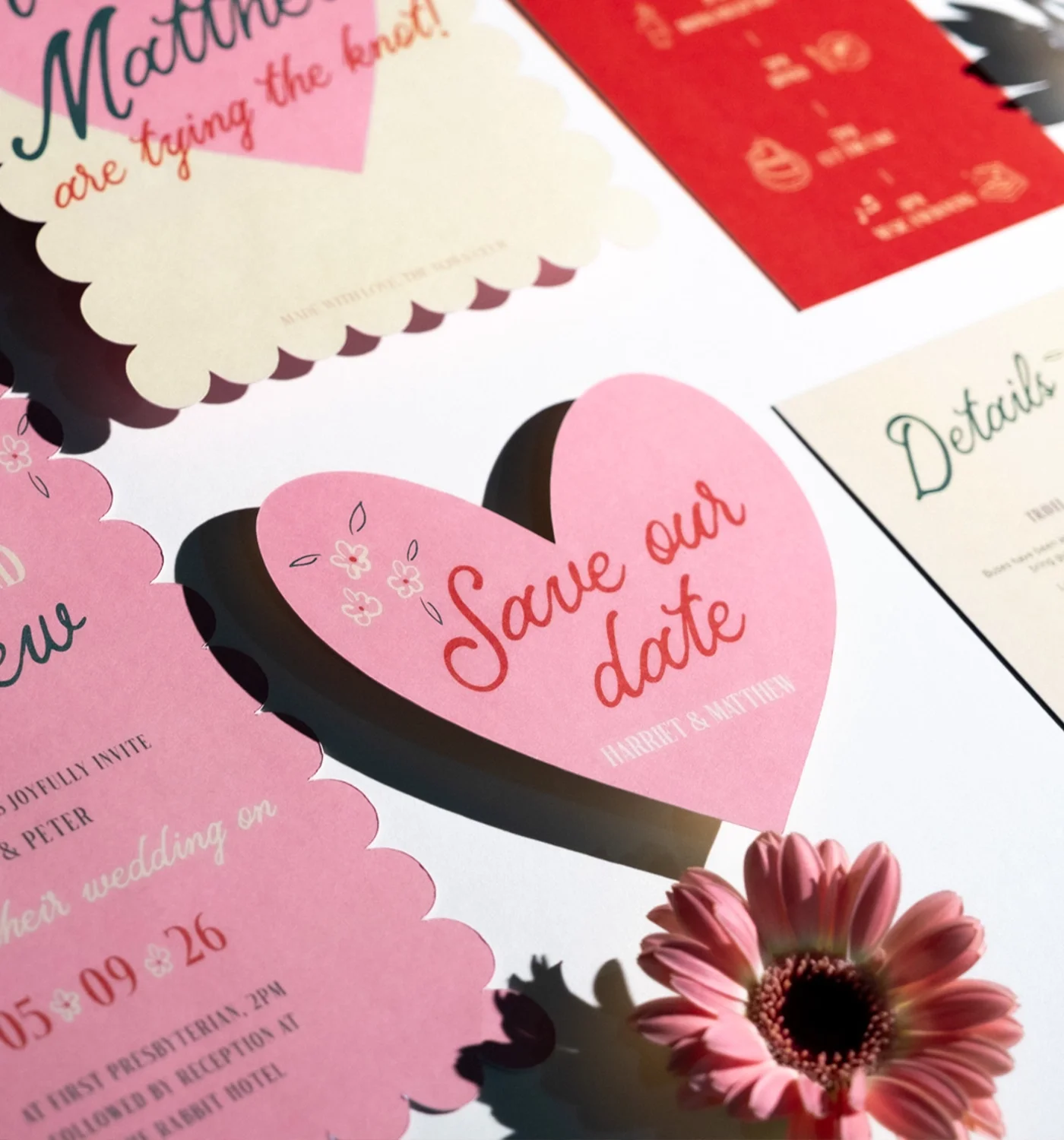 Pink and white wedding save the date cards with floral accents and a pink flower, featuring text for Harriet and Matthew's wedding on September 26 at 2 PM.