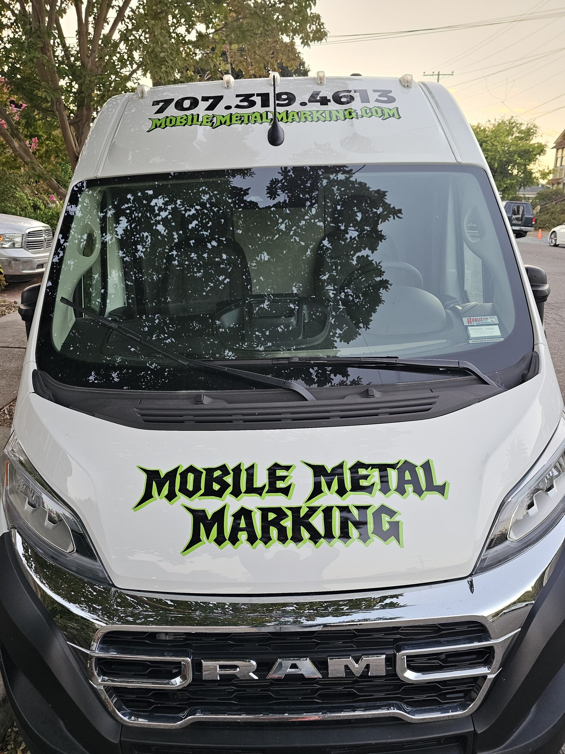 Front of the Mobile Metal Marking van, a mobile laser engraving and cleaning service