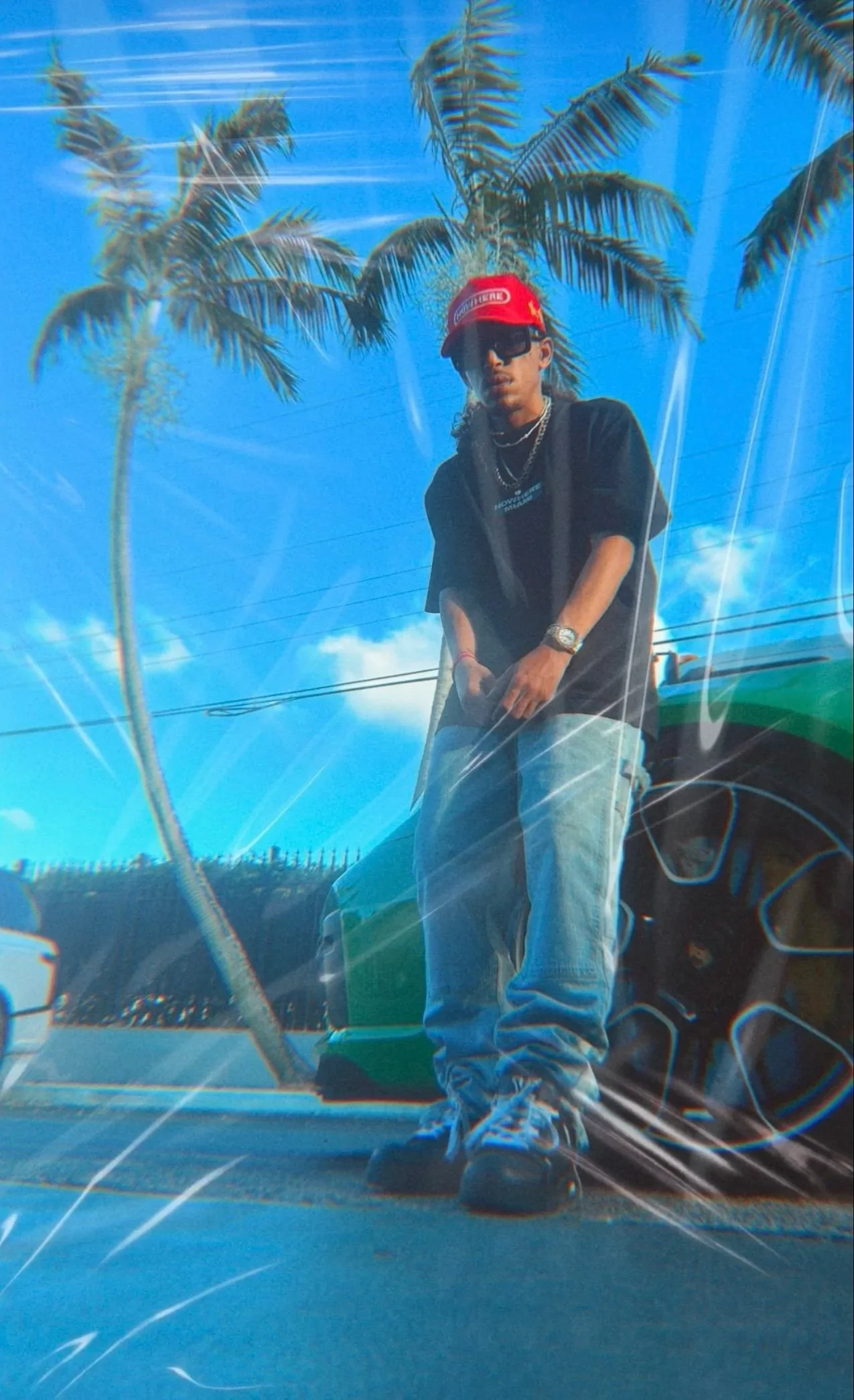 Yampi in Nowhere Miami F23 Kong Snapback Hat and SS22 Logo T-shirt