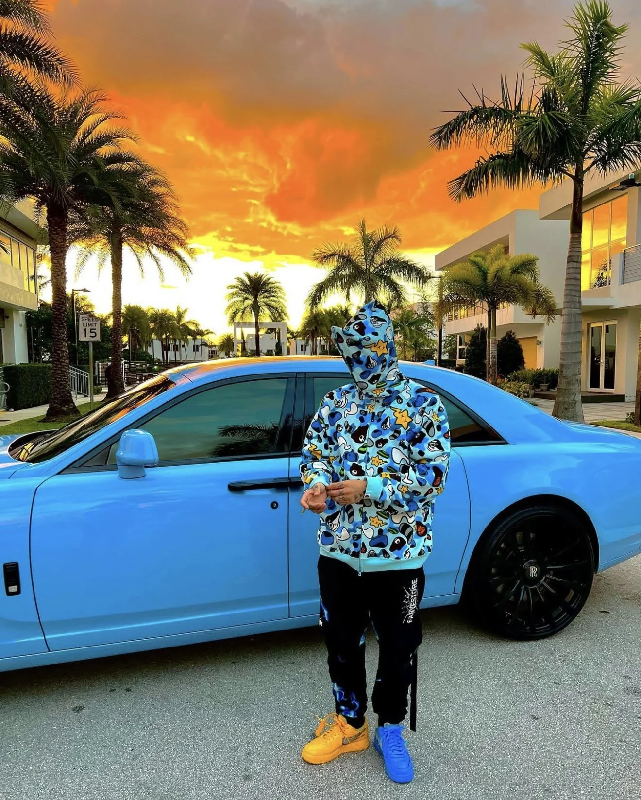 Ovi in an archive 2005 BAPE x KAWS Animal Kingdom ABC Blue Camo Hoodie and Nike x Off-White Air Force 1s