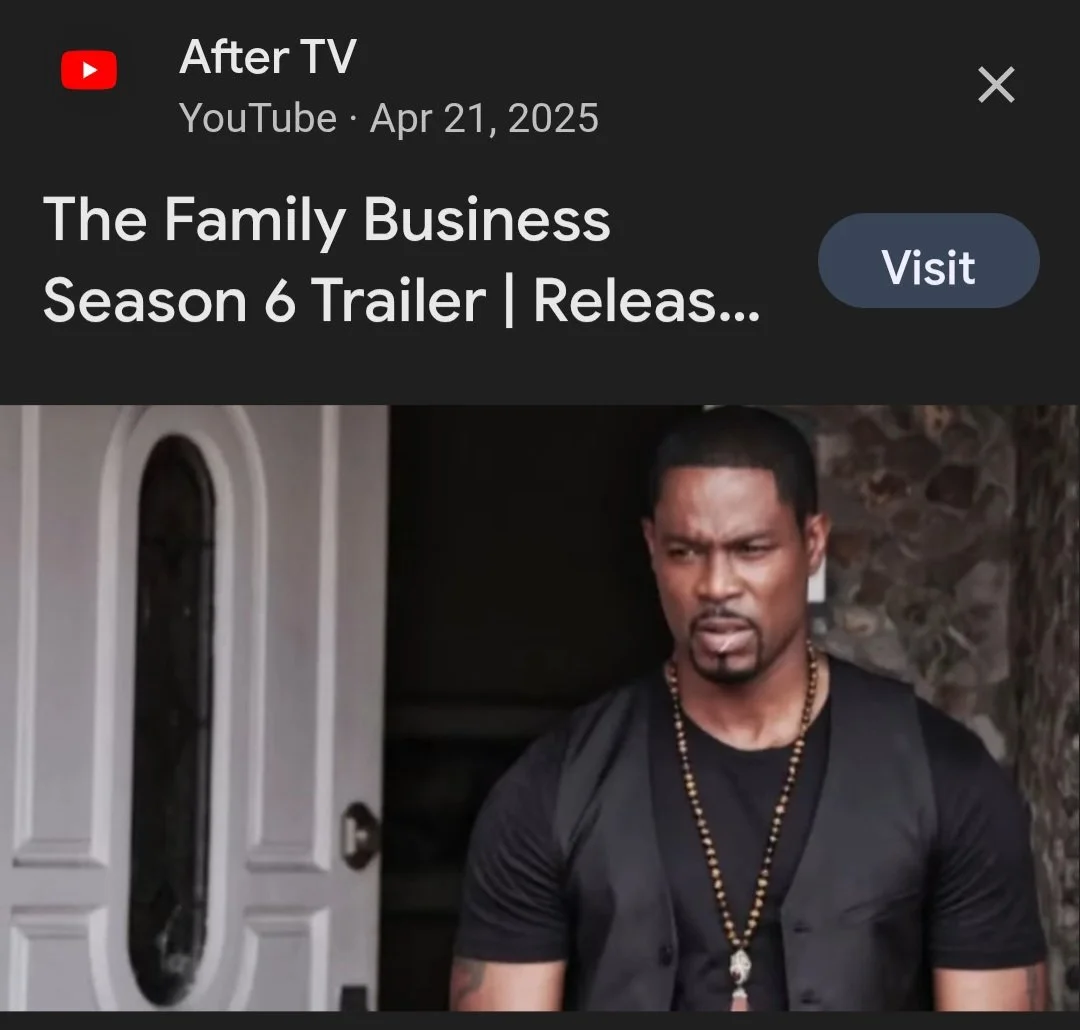 Darrin Henson, wearing a black shirt, a black vest, a beaded necklace, and a backpack.