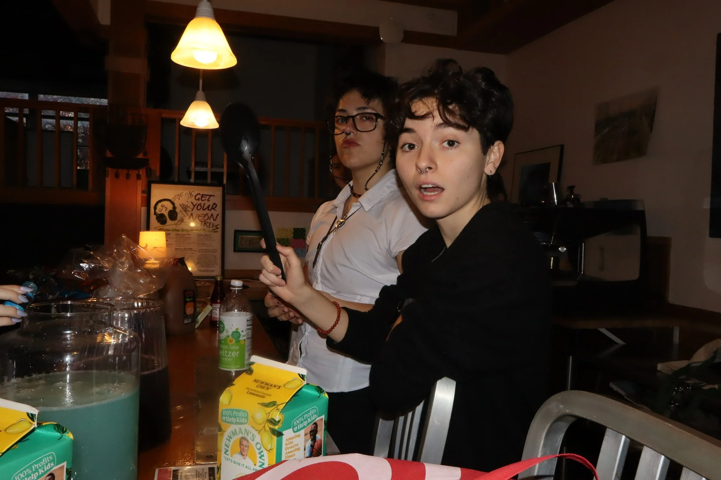 Riss and Everett making drinks for Spooky Stories event