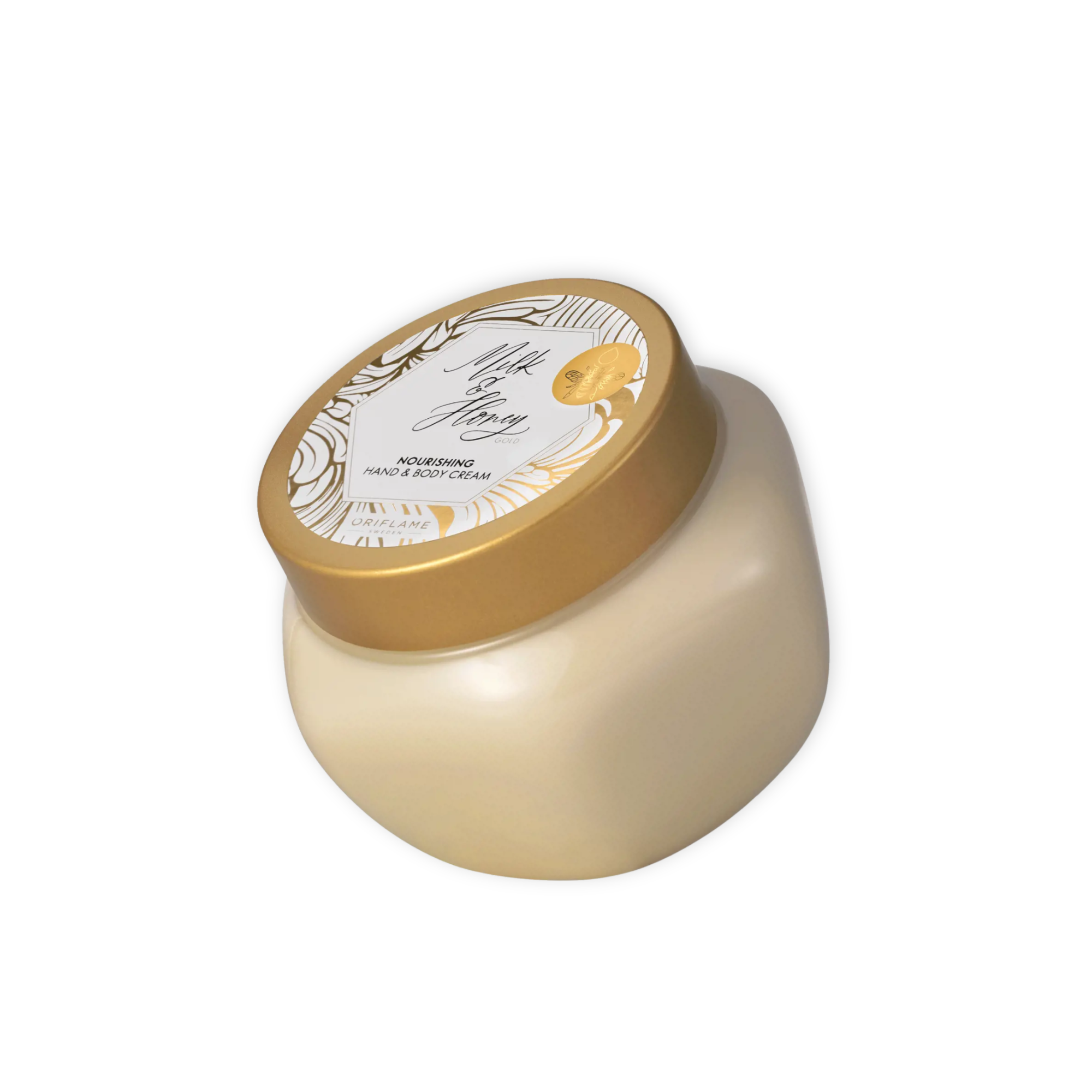 Tarro de crema corporal nutritiva Milk & Honey Gold de Oriflame sobre fondo blanco.