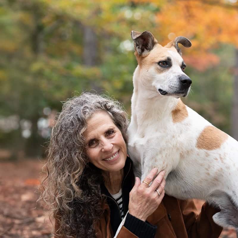 Lady and cattle dog looking at camera in brooklyn park