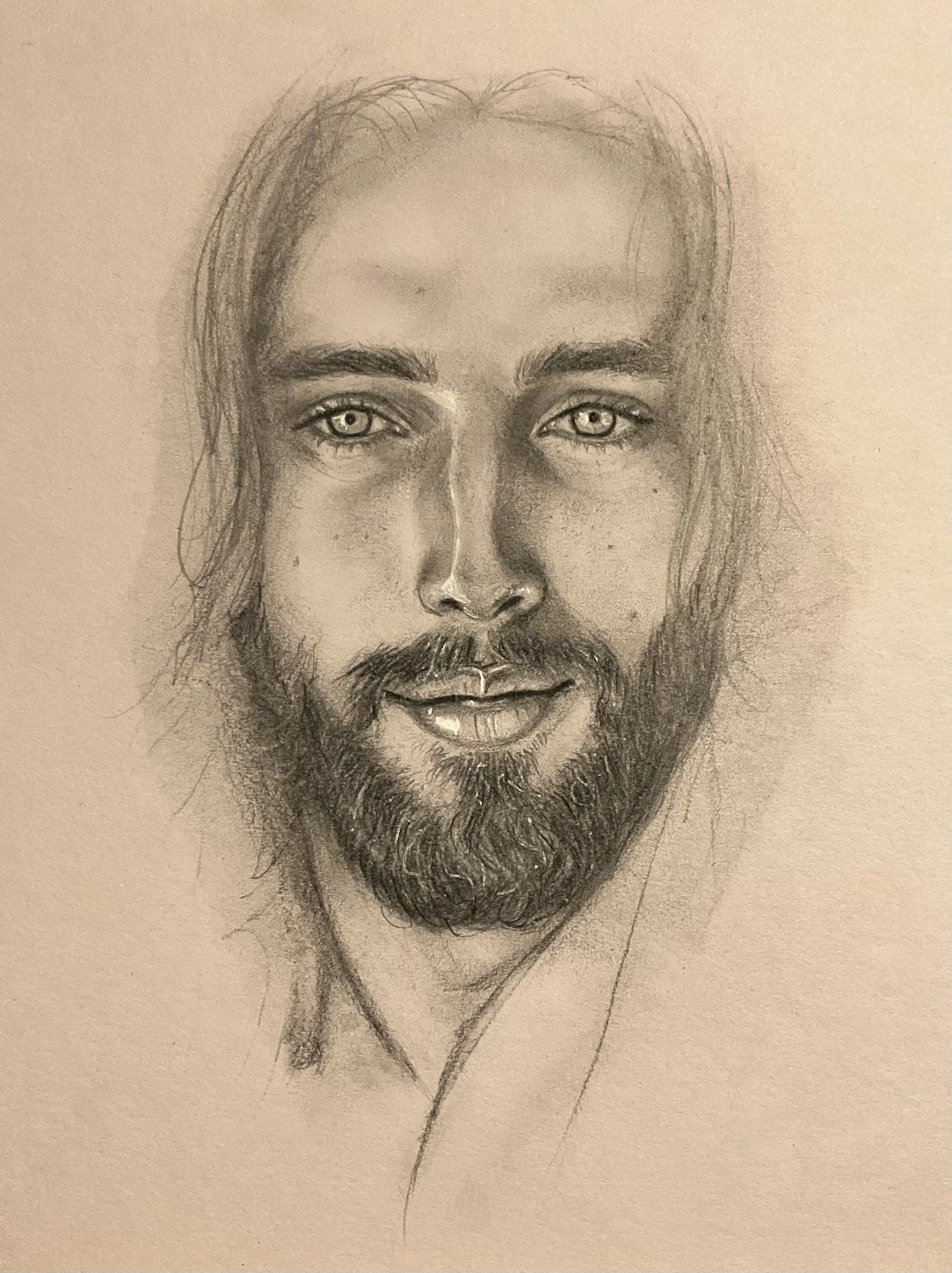 A detailed pencil sketch of a man's face with long hair, a beard, and light-colored eyes.