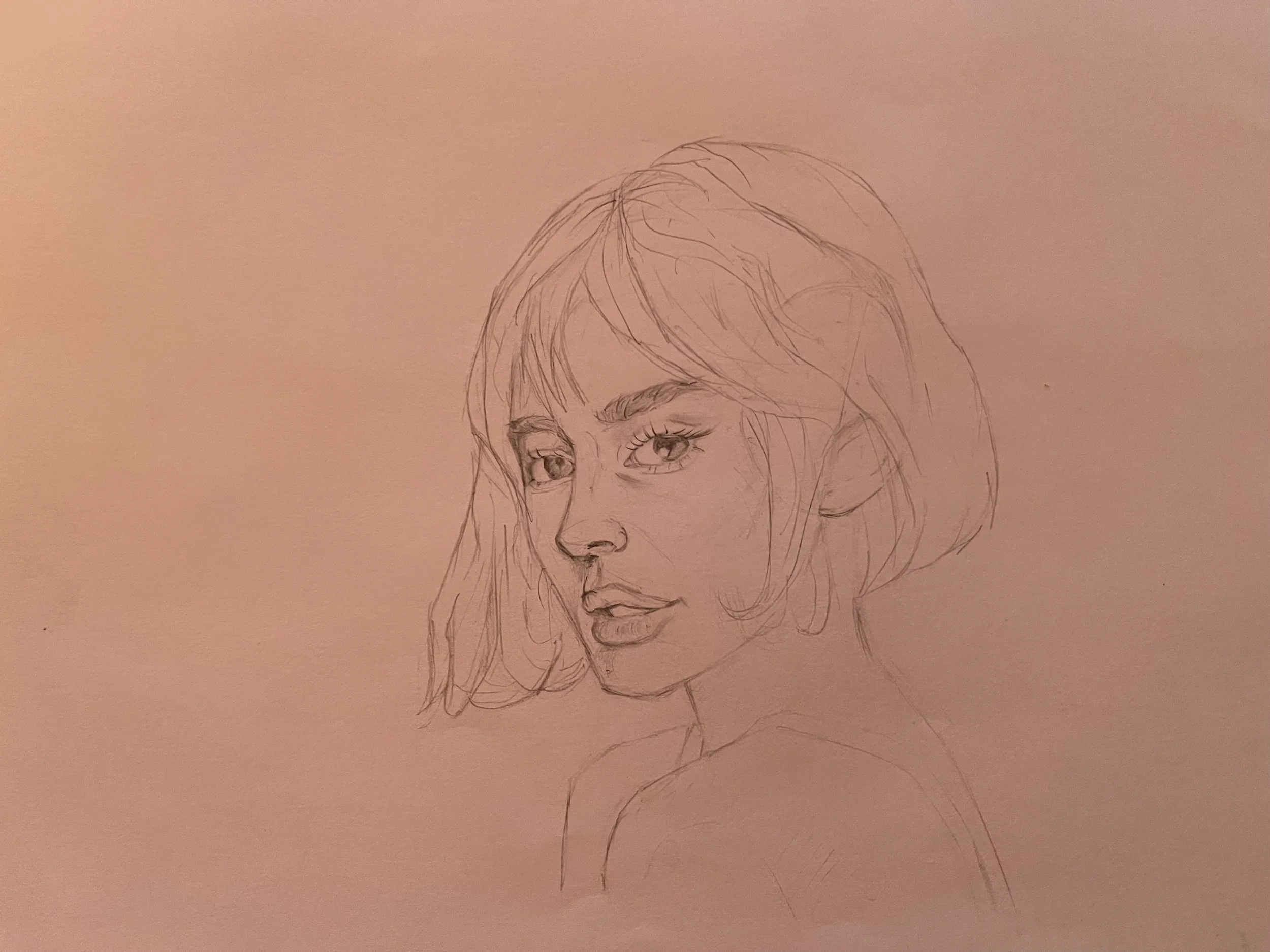 Graphite portrait sketch of a woman’s face, focusing on likeness, proportion, and expression.