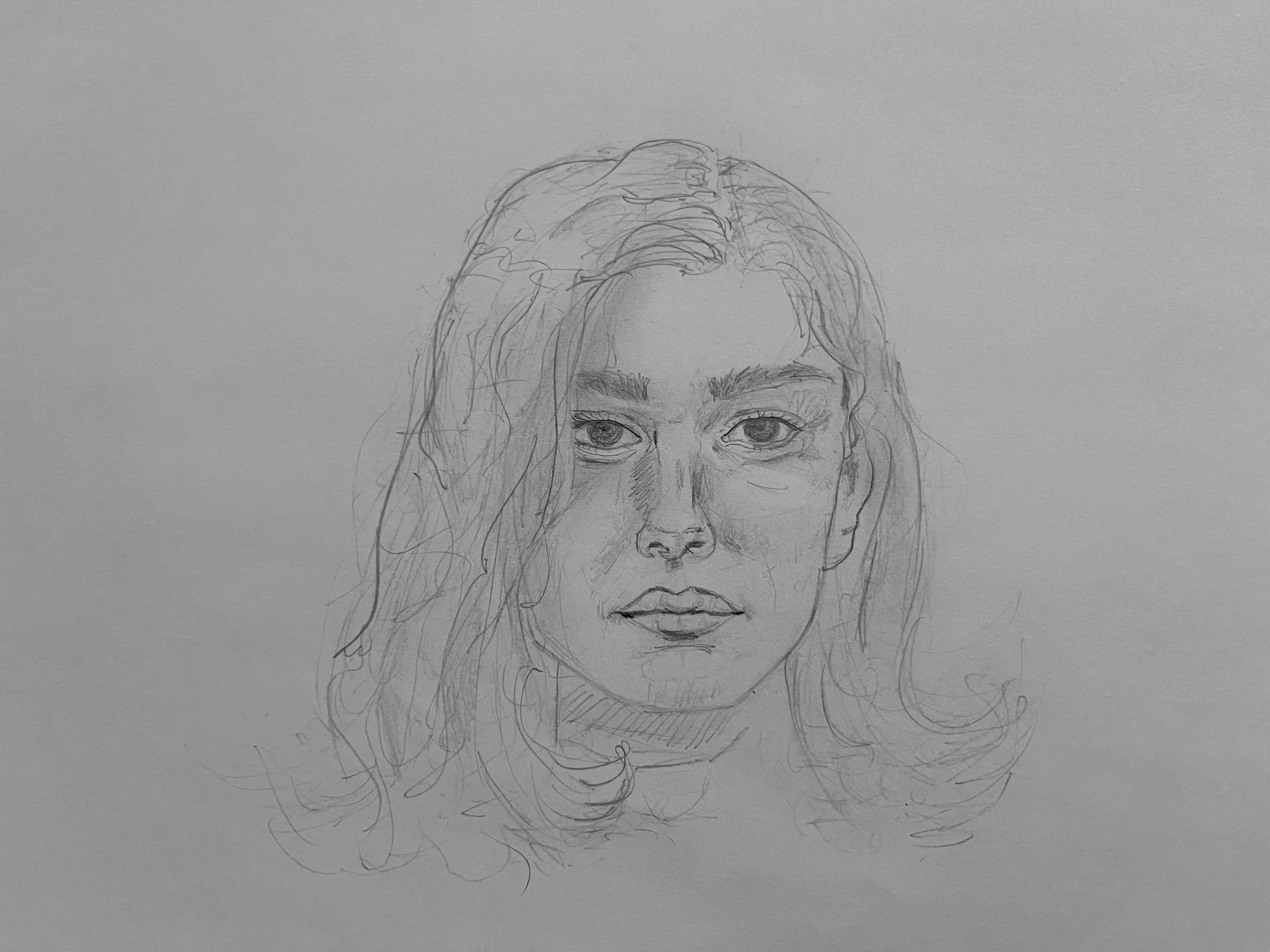 Sketch of a woman's face with detailed eyes, nose, and lips, and wavy hair surrounding her face on a plain background.