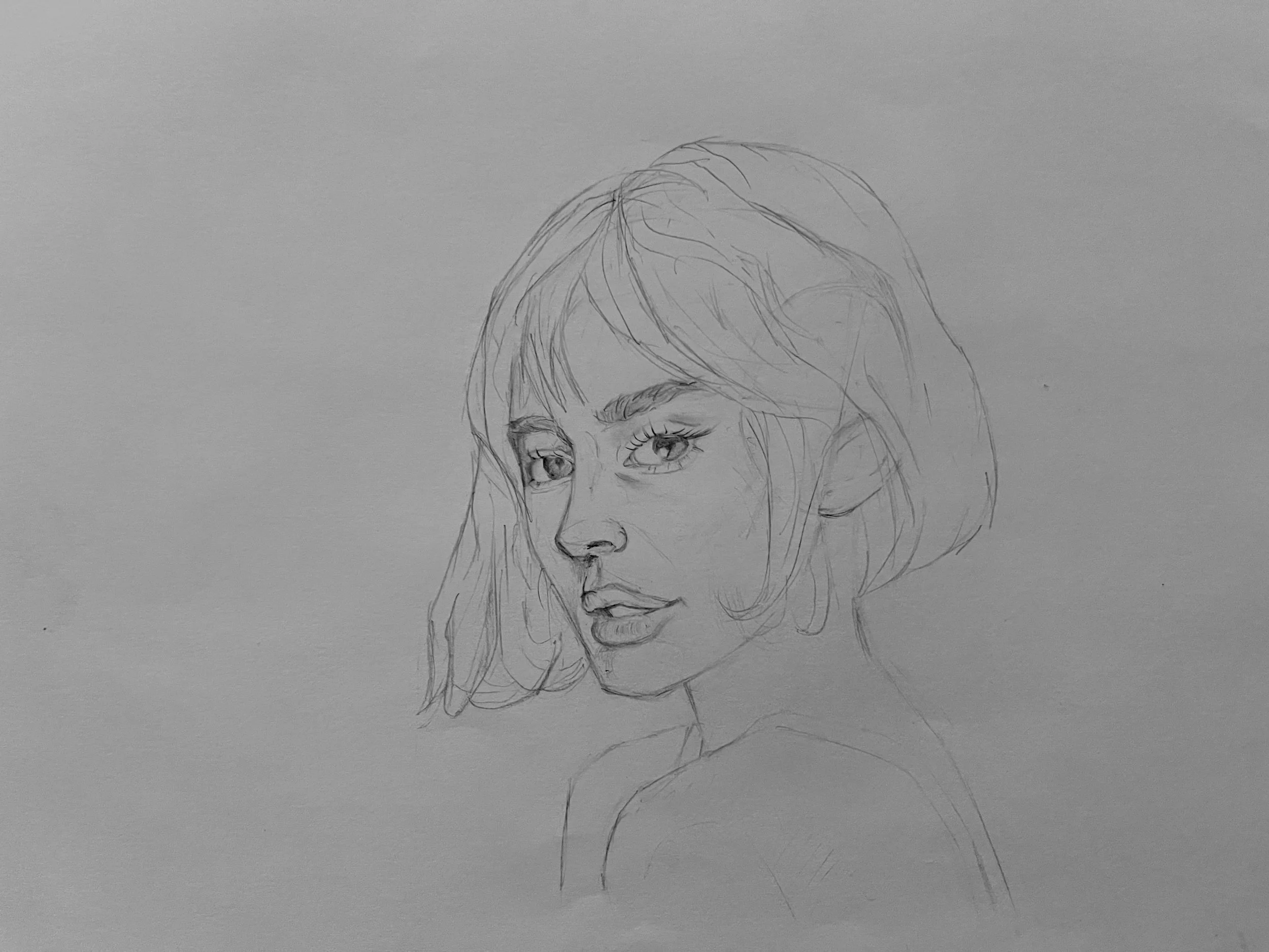 Graphite portrait sketch of a woman’s face, focusing on likeness, proportion, and expression.
