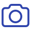 A simple line drawing of a camera icon.