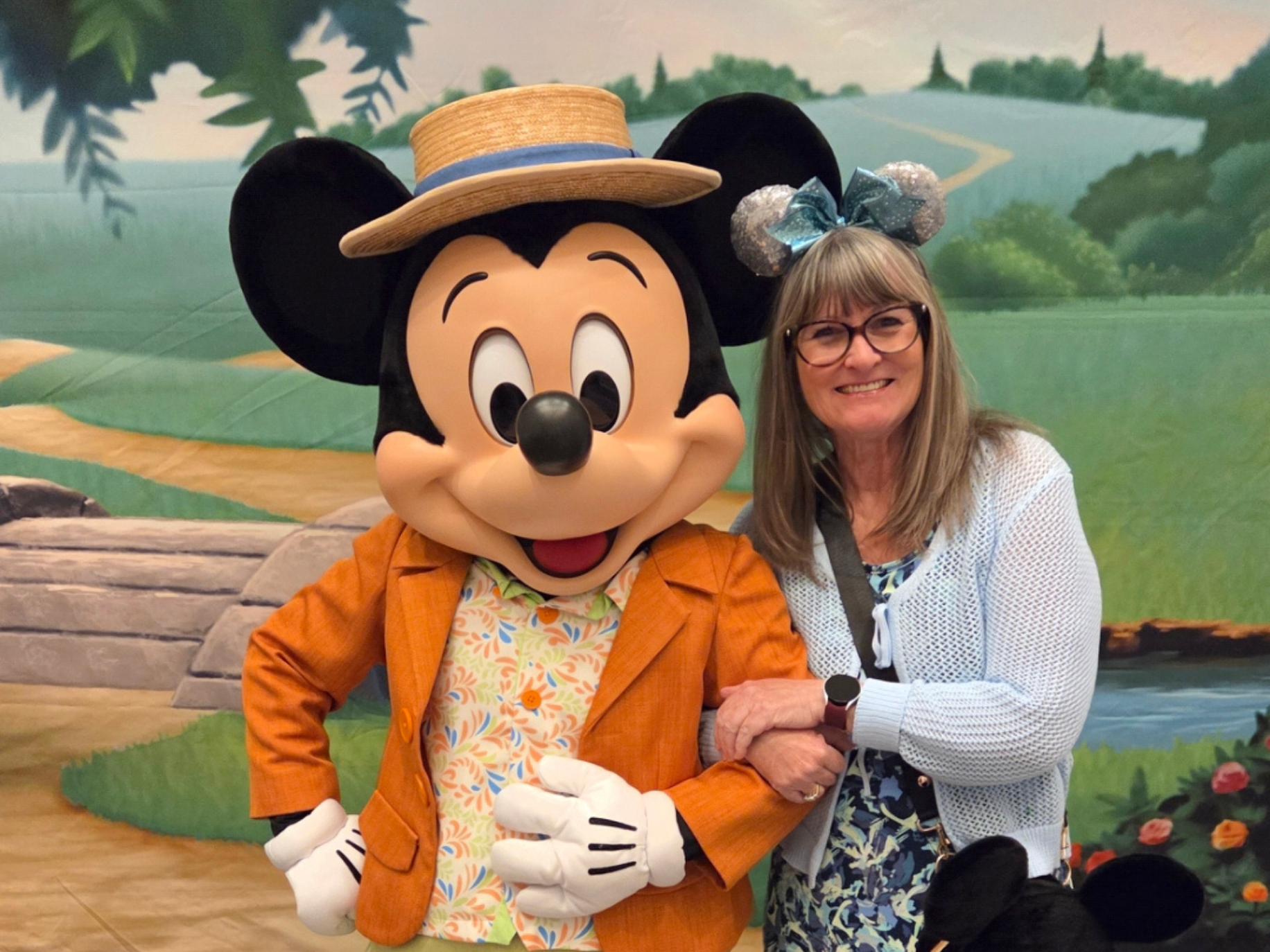 Laura with Mickey Mouse dressed in his Sunday best