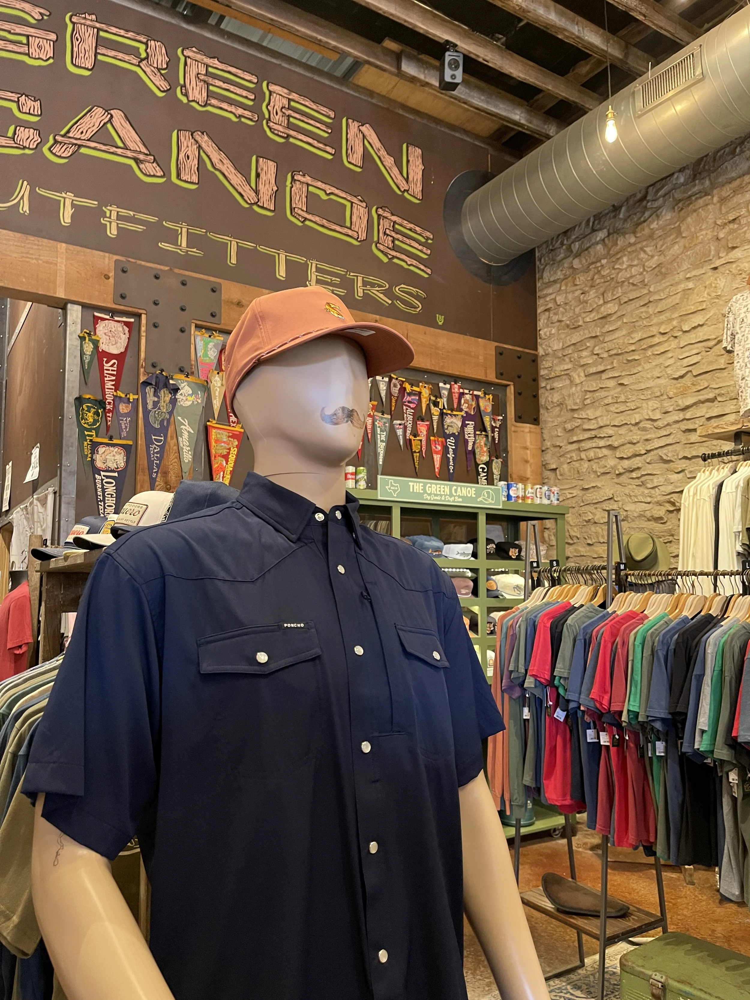 mannequin with a blue shirt and orange hat in hico tx
