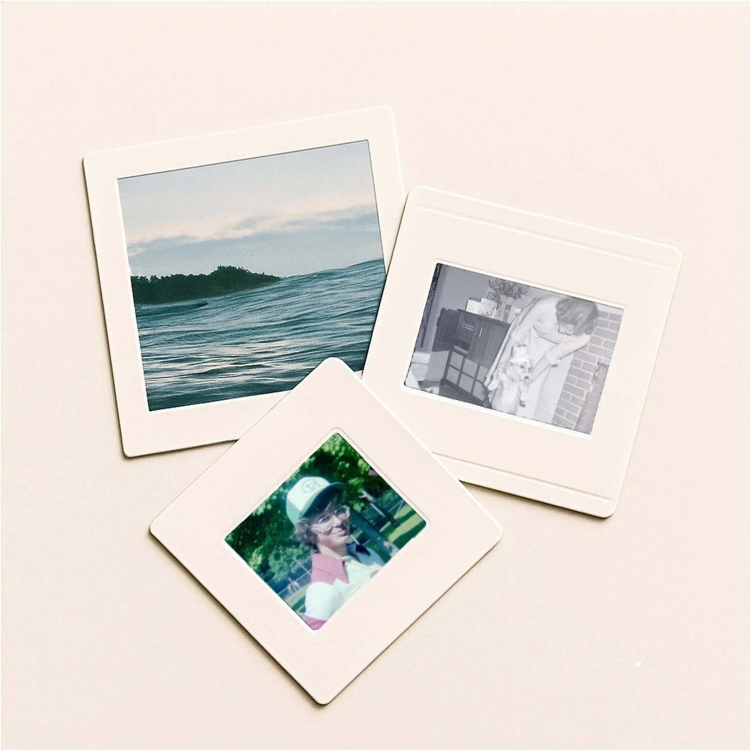 Printed photos, mounted slide, and 35mm film negative used for photo scanning.