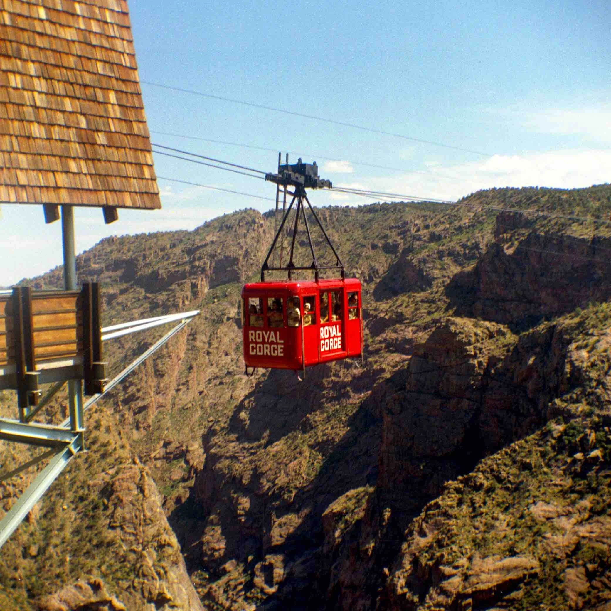 Sample high-resolution photo scan showing a red cable car over a canyon.