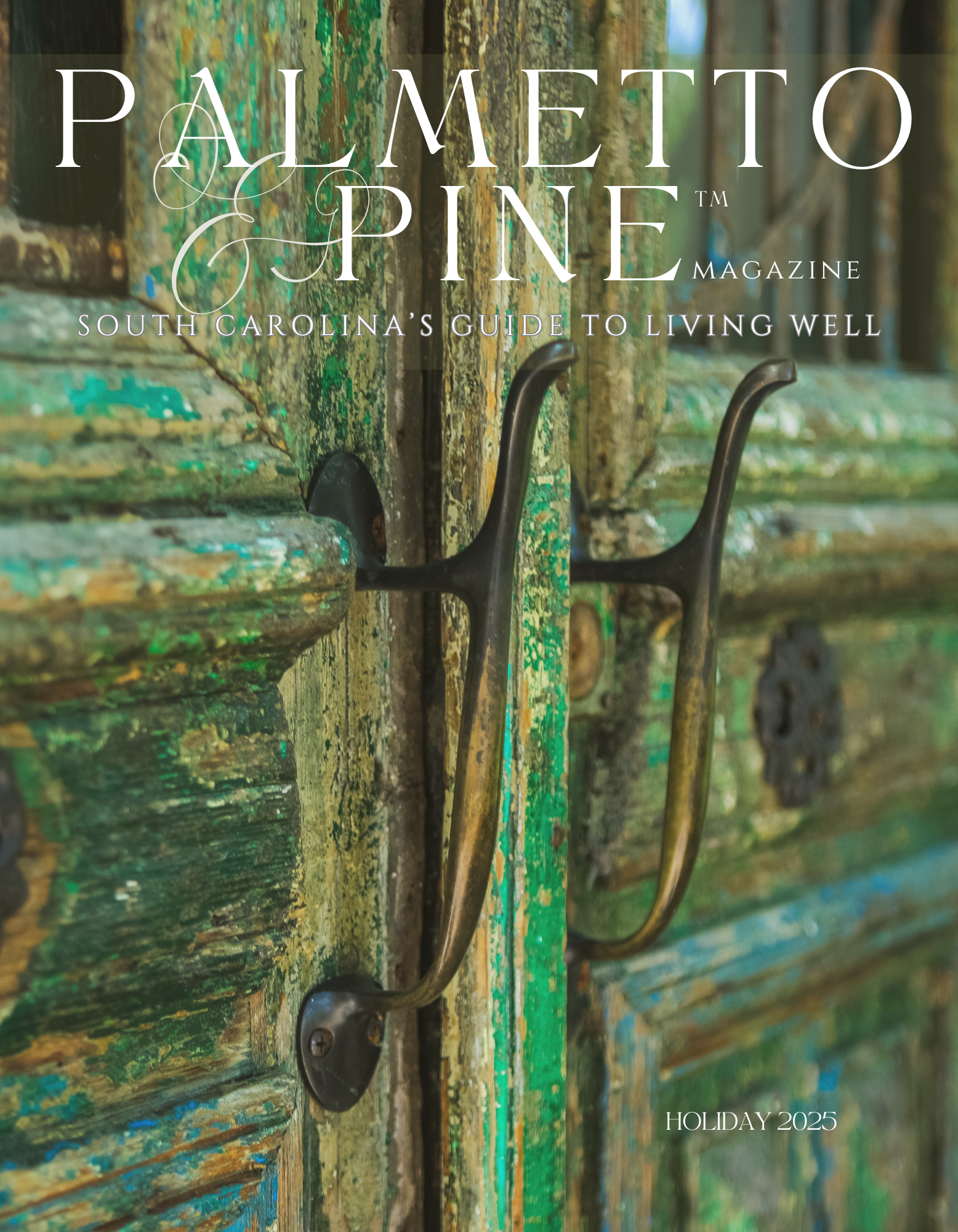 Close-up of an old, weathered wooden door with peeling green paint and black metal handles.