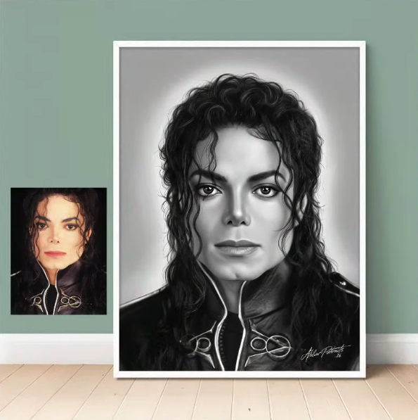 Black and white portrait of Michael Jackson with curly hair, signed by the artist. Behind it is a color photo of Michael Jackson.