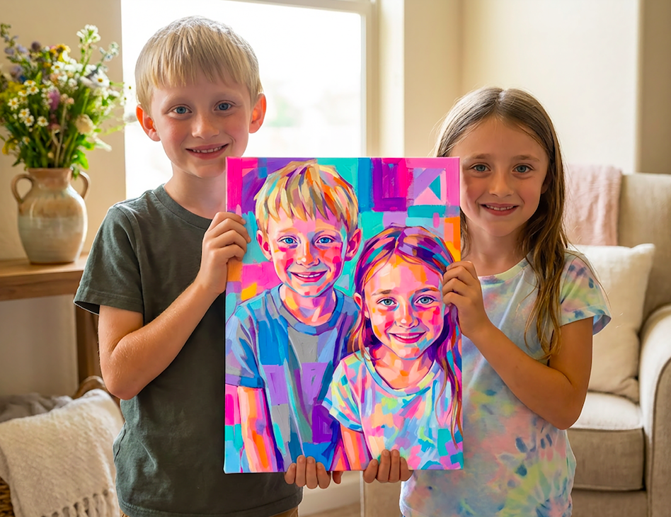 Two children, a boy and a girl, are smiling and holding a colorful painting of themselves. They are inside a bright room with a window, a beige sofa, and a vase of flowers in the background.