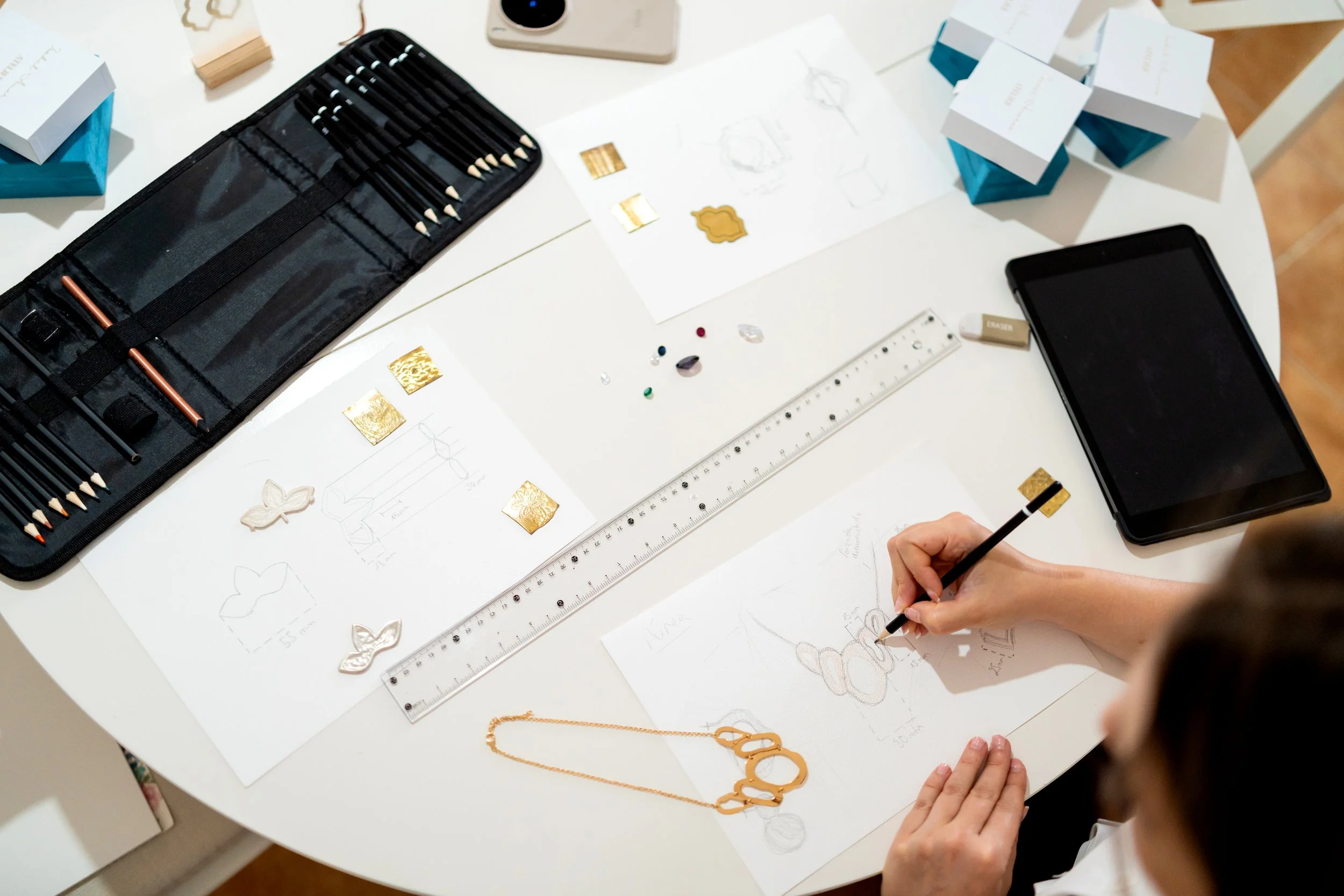 jewelry-designer-sketching-necklace-concepts-at-a-2026-08-10-21-18-55-utc.jpg