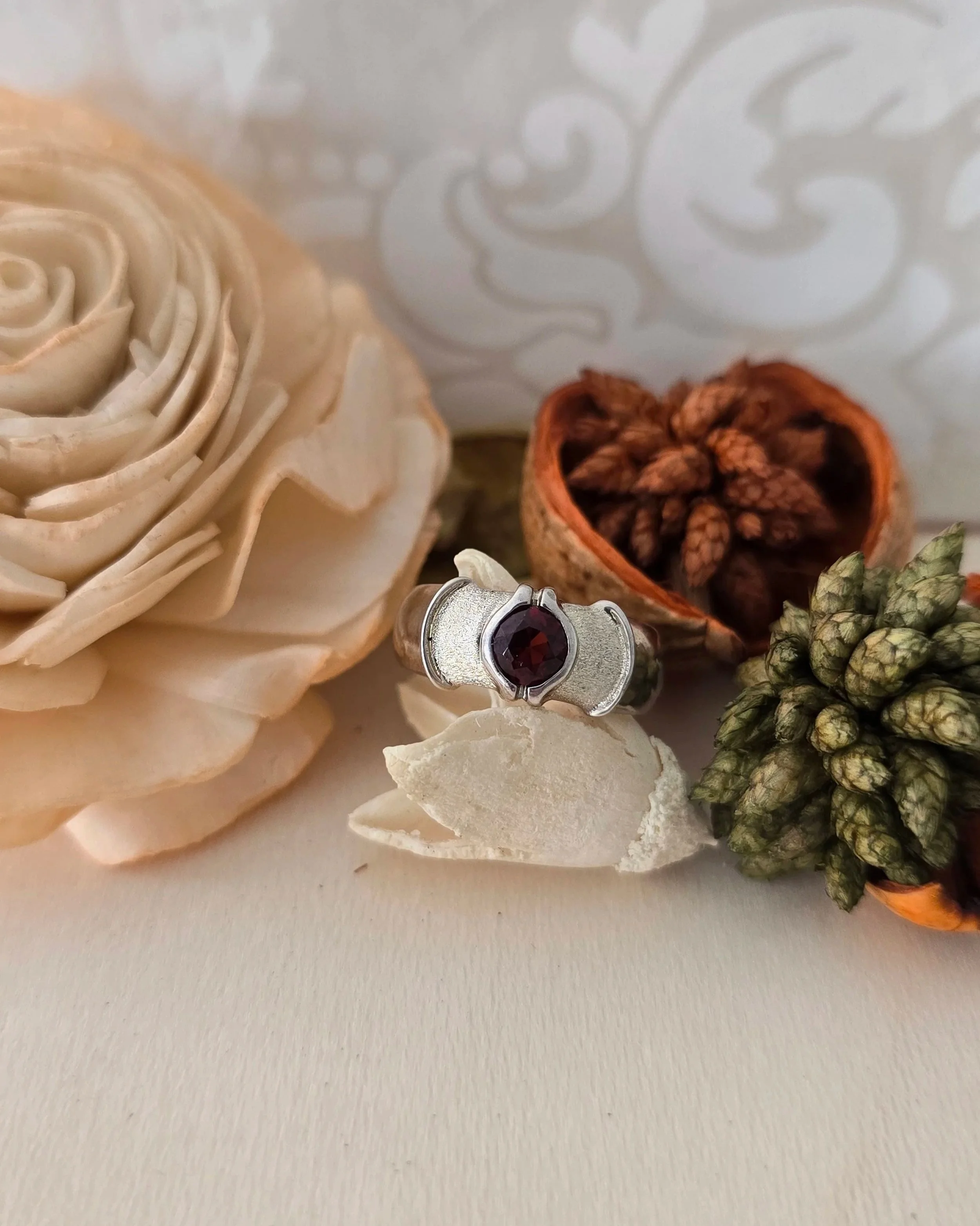 Silver garnet solitaire