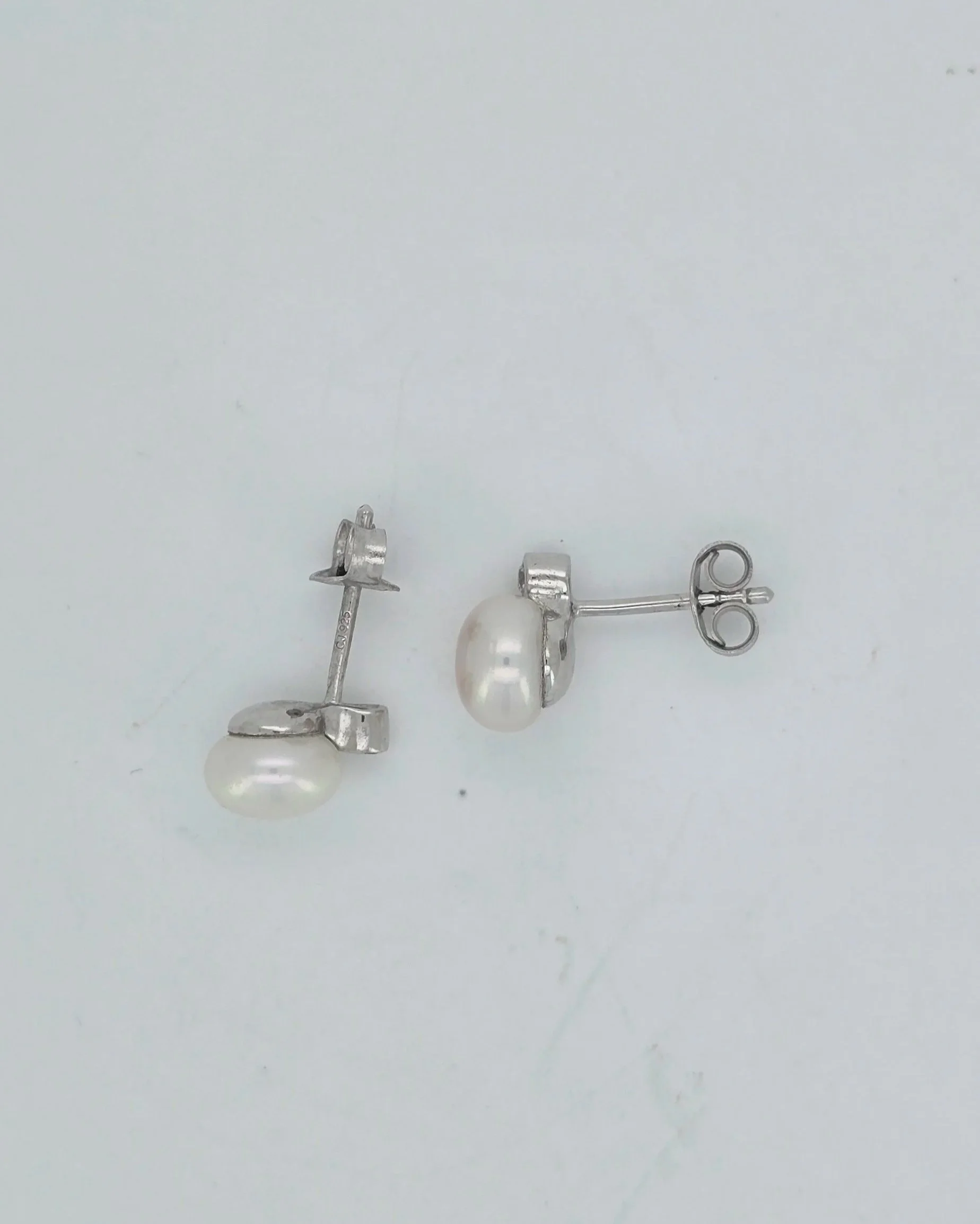 Sterling silver cz stud with 7mm white freshwater pearl