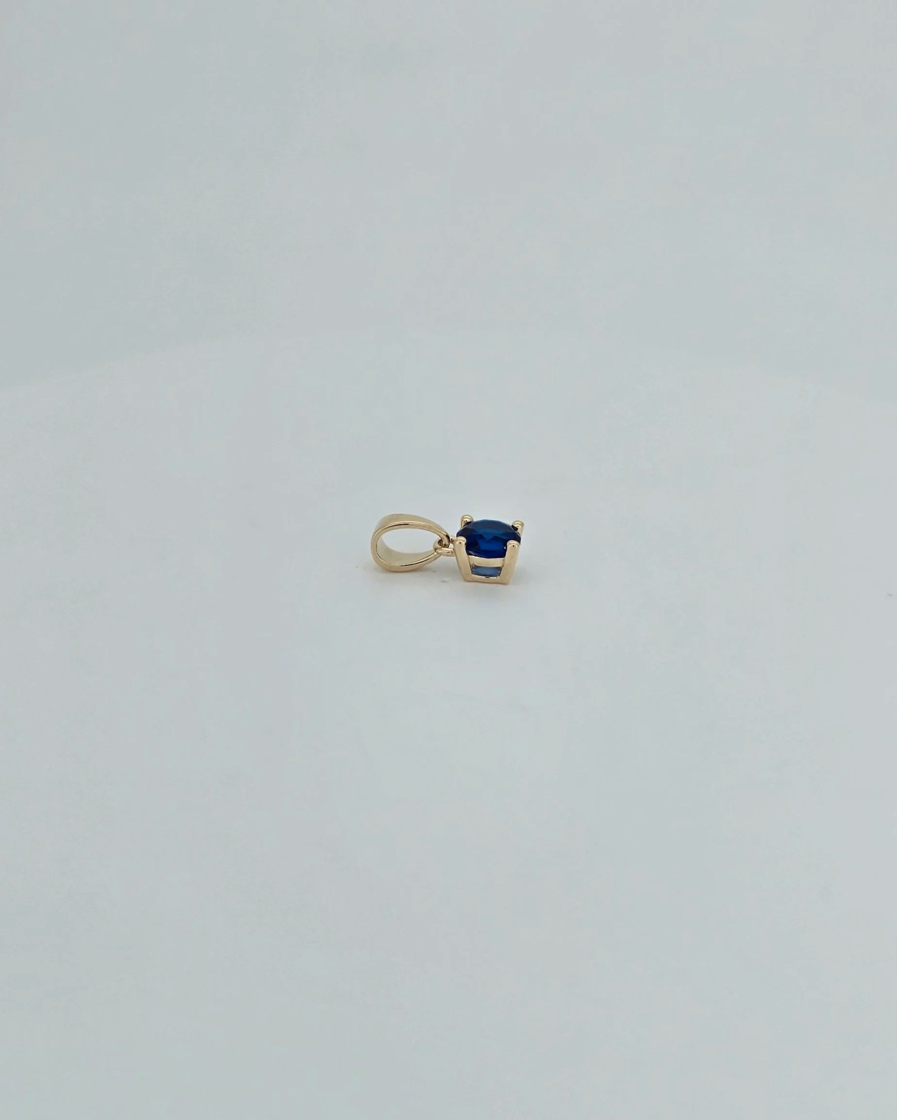 9ct Yellow Gold September Synthetic Sapphire Pendant