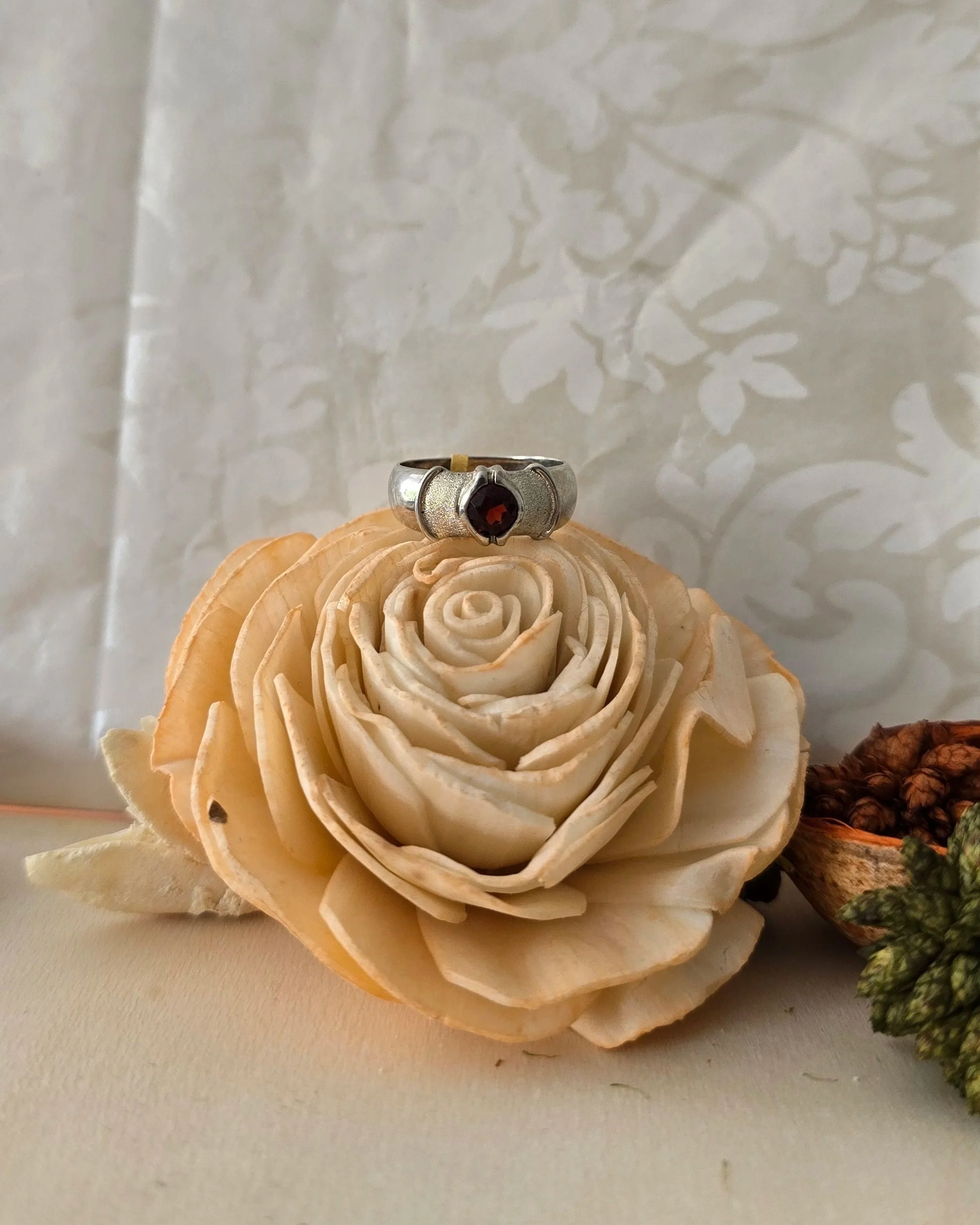 Silver garnet solitaire