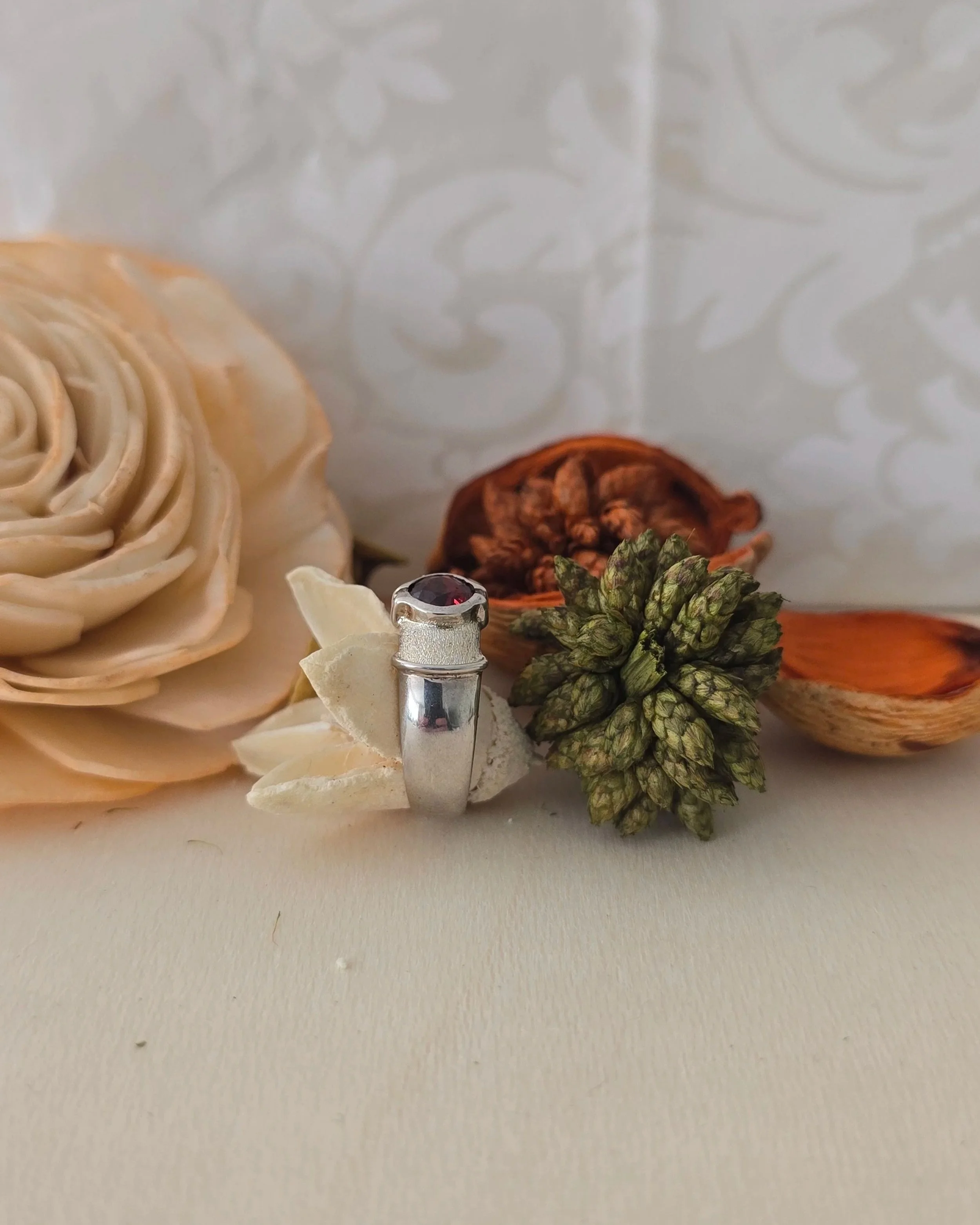 Silver garnet solitaire