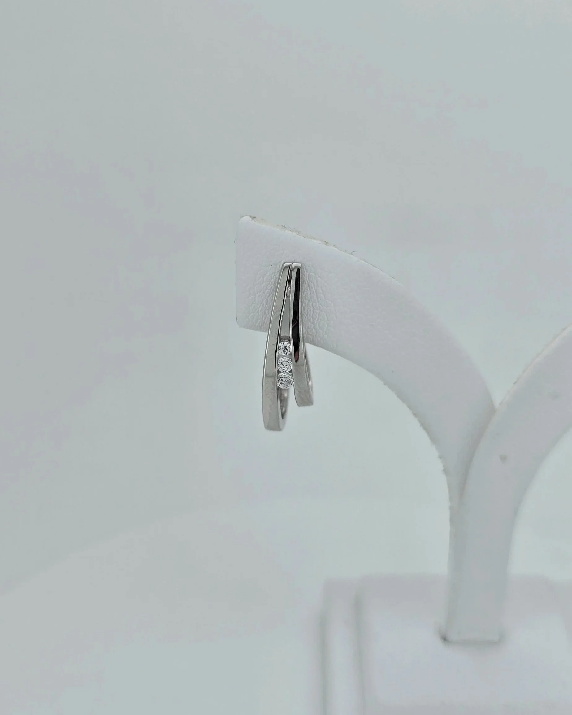 Sterling Silver Double U-Shaped CZ Huggie Earrings