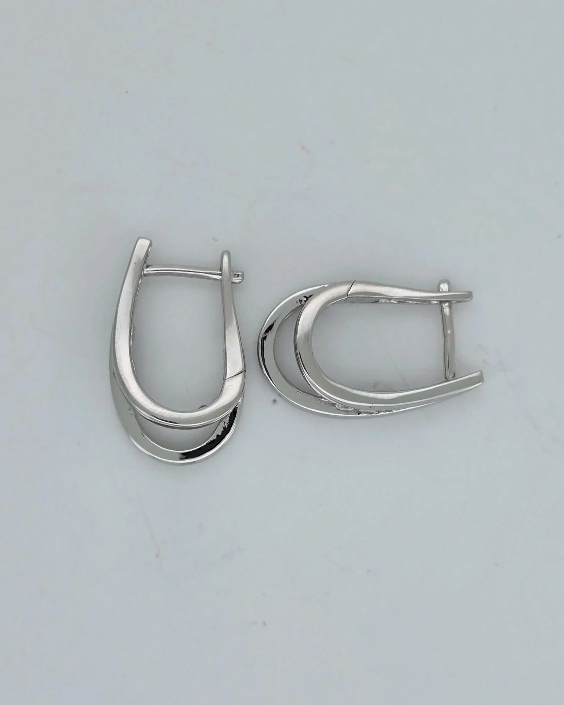 Sterling Silver Double U-Shaped CZ Huggie Earrings