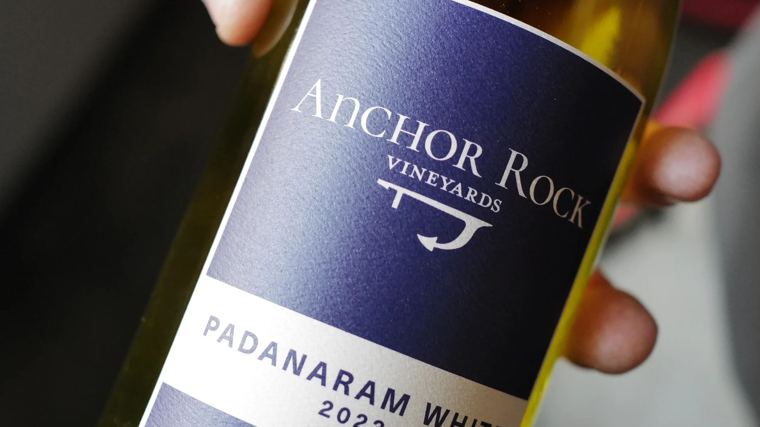 Close-up of a wine bottle label reading "Anchor Rock Vineyards" with the word "Padanaram" and the year 2023.