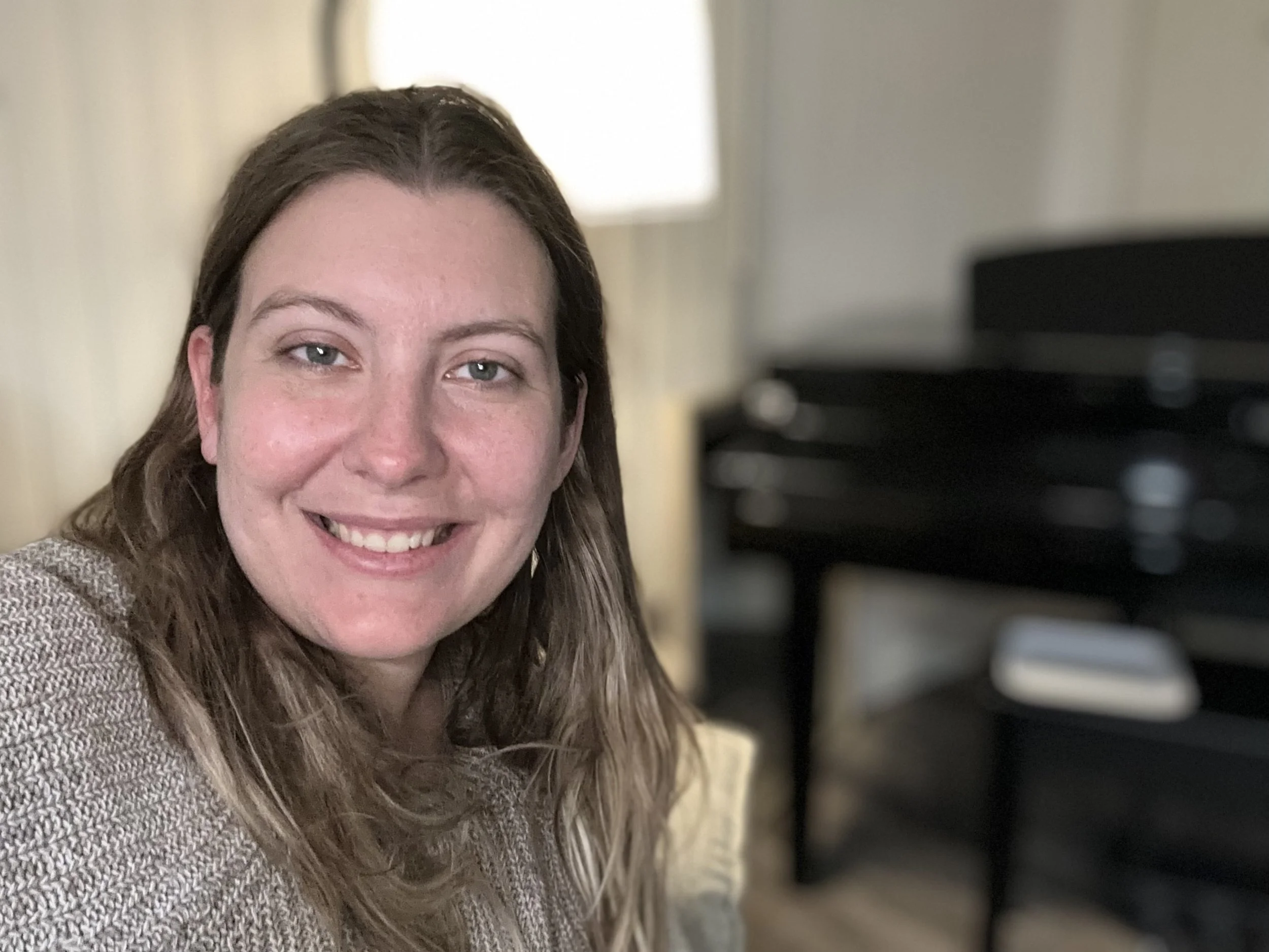 Photo of person in front of piano