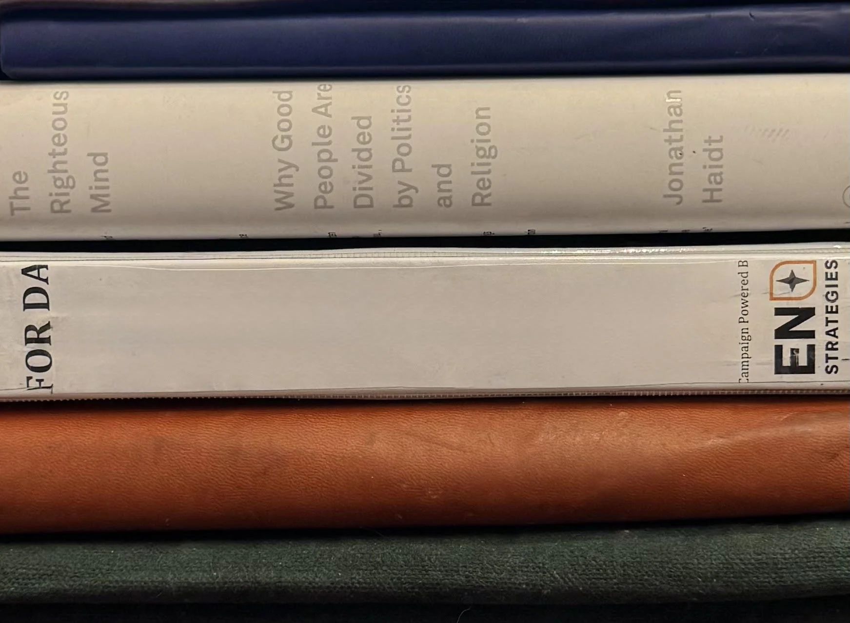 EN Strategies Candidate Accelerator campaign binder stack