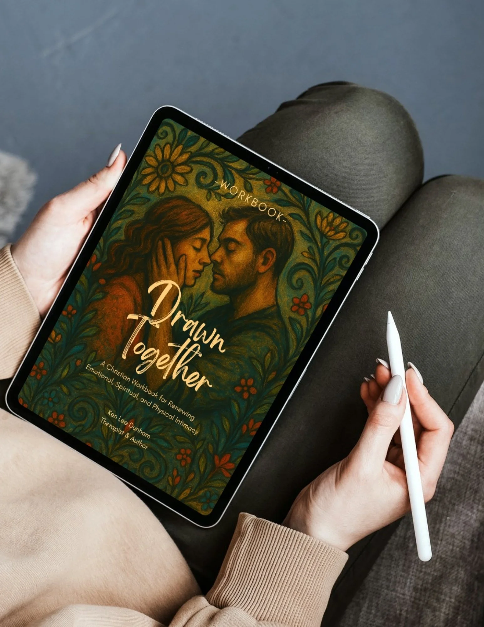 Drawn Together Christian marriage workbook displayed on a tablet, featuring the illustrated garden cover.