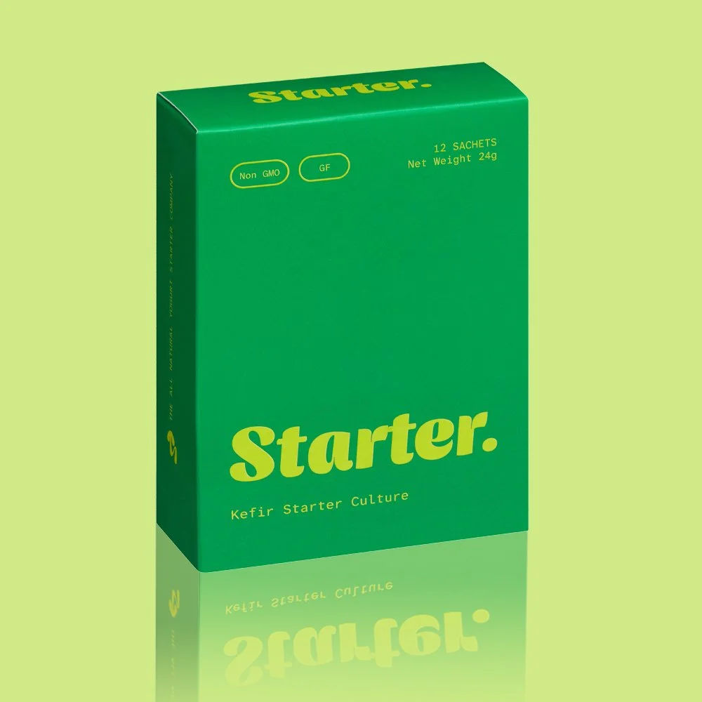 Green box of kefir starter culture labeled Starter with Non GMO and GF icons, 12 sachets, and net weight of 24 grams.