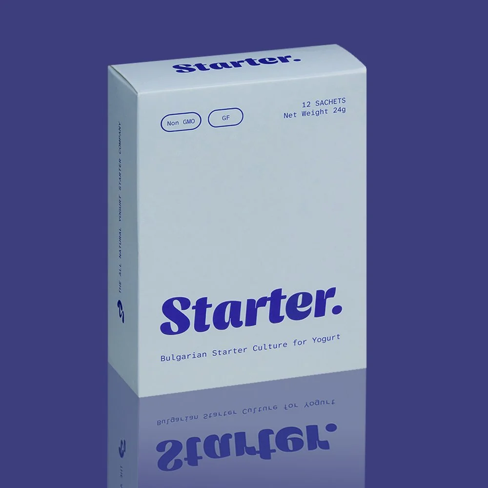 A white box of Bulgarian starter culture for yogurt with blue text and graphics, labeled 'Starter,' with details about the product and certifications on a blue background.