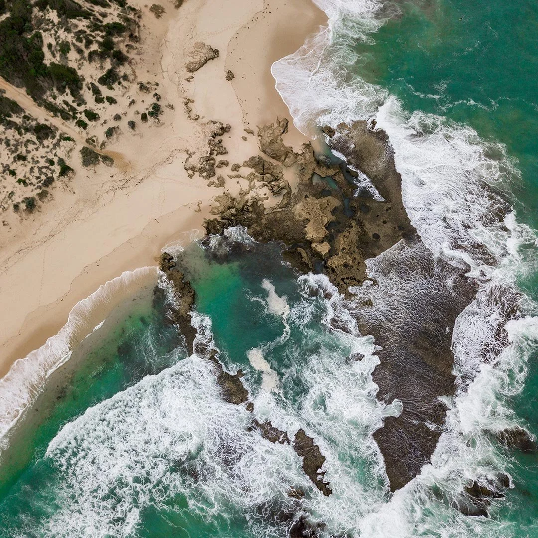 An aerial view of a beach on the Mornington Peninsula