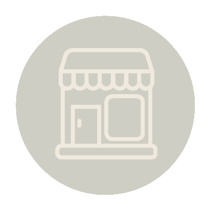Icon of a small storefront or shop with an awning and a window