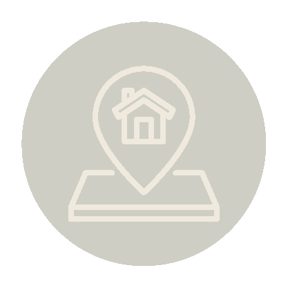 Icon of a house inside a location pin over a map or tablet.