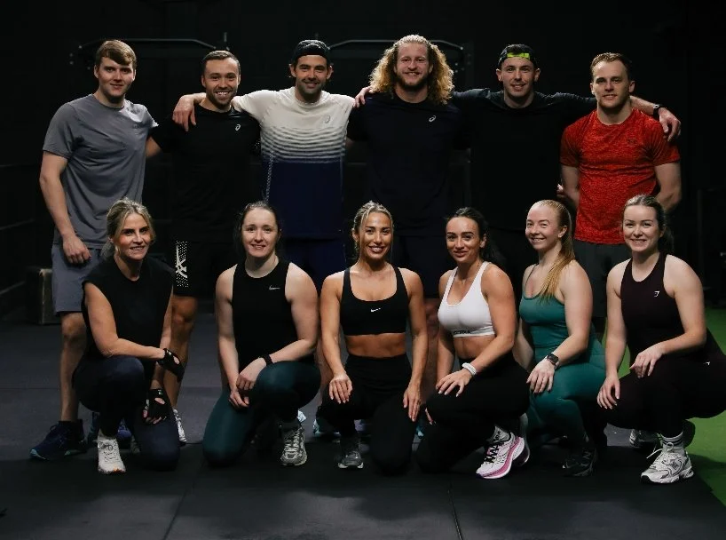 Group of personal training clients in Liverpool after a coached strength training session.
