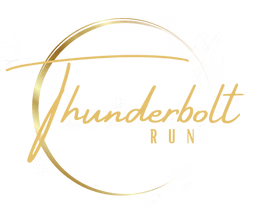 Stylized logo with gold and black elements, featuring a circular design and text, possibly related to a brand or event.