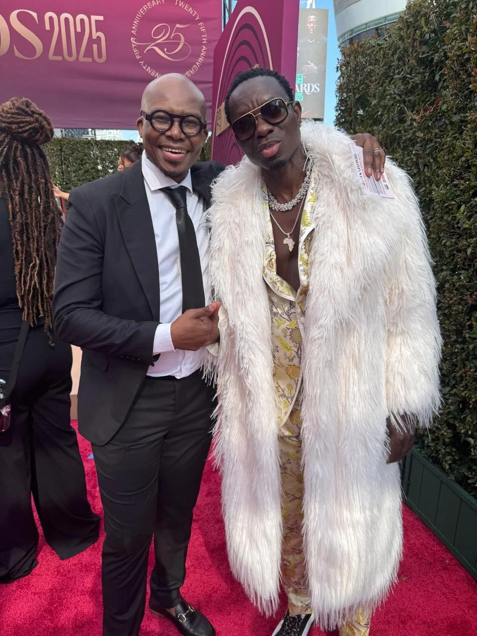 Michael Blackson and Monde Twala at the Bet Awards. Blackson won the Global Good Award that year