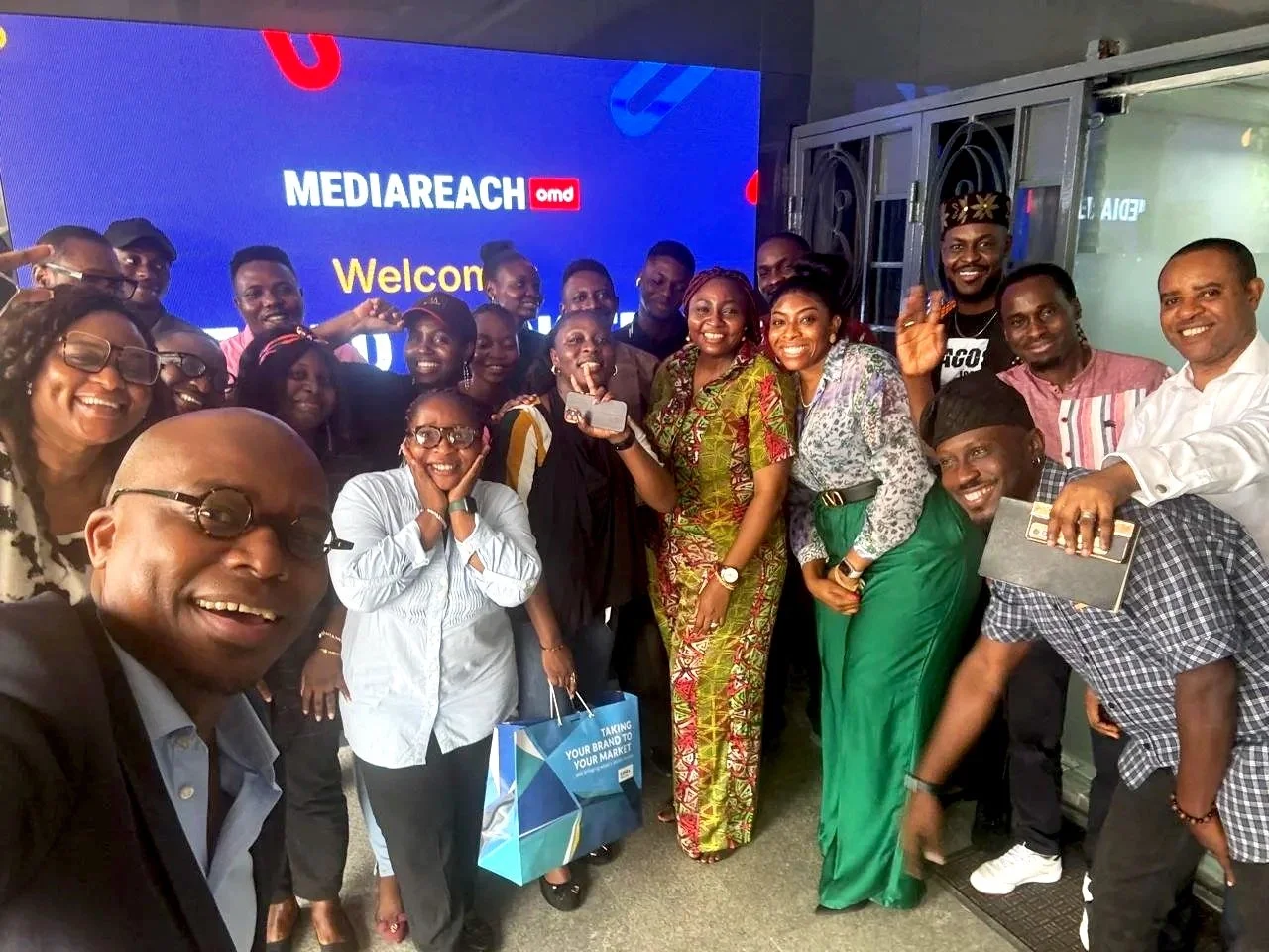 Monde Twala and the Media React agency in Lagos, Nigeria