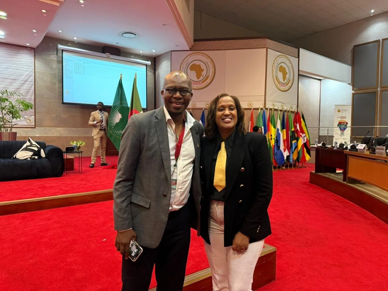 Marina Madale and Monde Twala at the AU's APRM Youth Symposium after speaking on the importance of youth mental health and child online protection