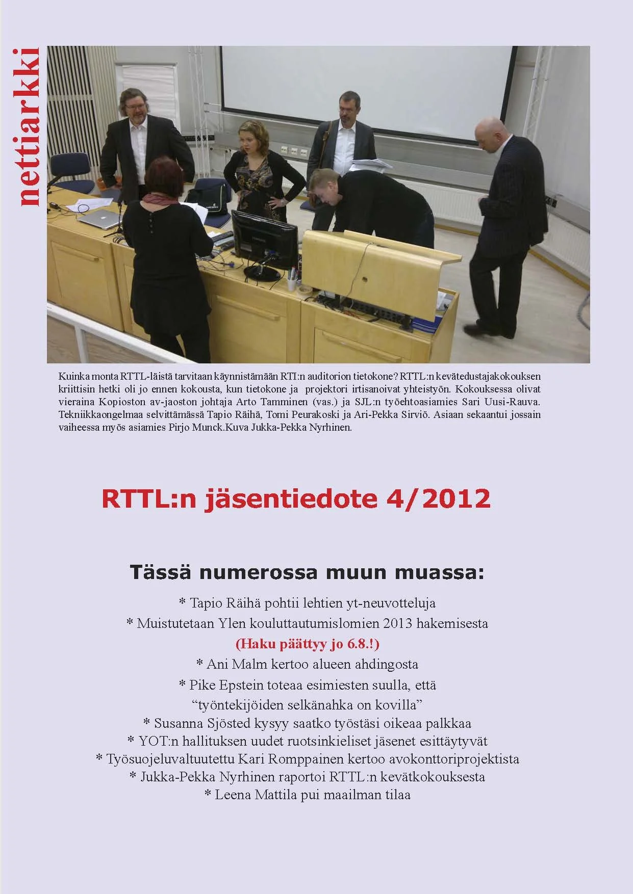 "Liiton Arkki" kansilehti, jossa ryhmä ihmisiä keskustelemassa ja työskentelemässä auditoriolla.