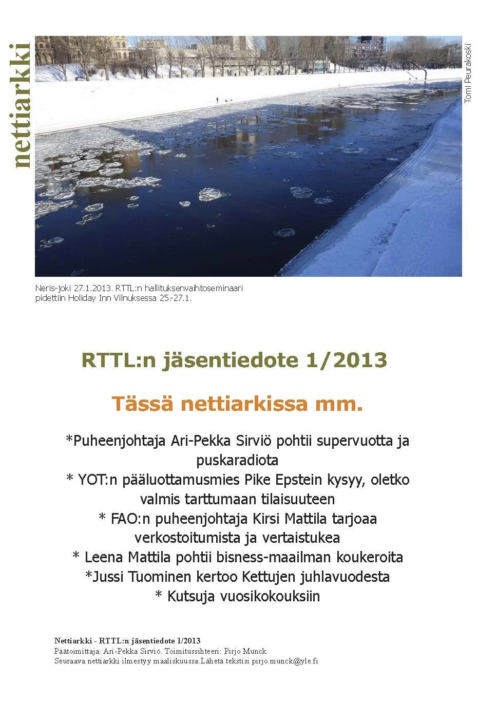 Jäinen vesistö keskellä talvista kaupunkiympäristöä, talvi ja jäätynyt vesi, lumipeitteiset rannat ja rakennukset taustalla. "Liiton Arkki" kansilehti.