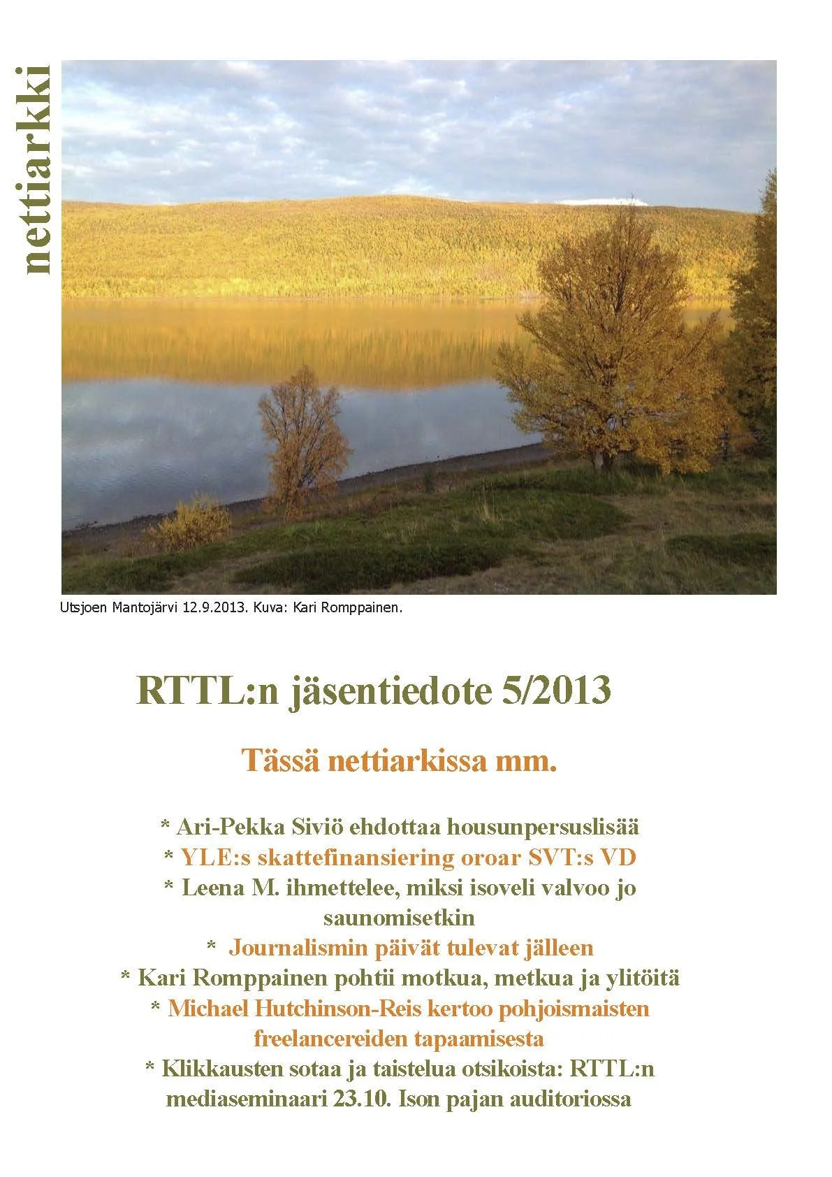 Kuvassa on järvimaisema syksyllä, kellertäviä ja vihreitä puita ja heijastuksia järven pinnassa, taivaalla pilviä. "Liiton Arkki" kansilehti.